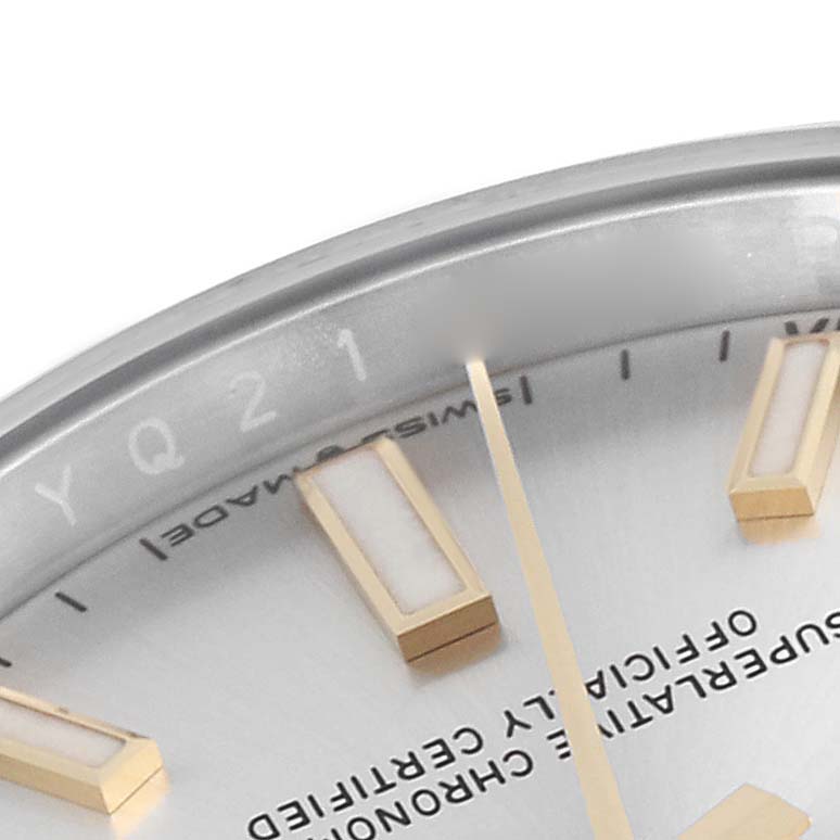 The image shows a close-up of the dial and markers on a Rolex Oyster Perpetual 124200 Men's Stainless Steel Silver Dial 124200 Men's Stainless Steel Silver Dial watch.
