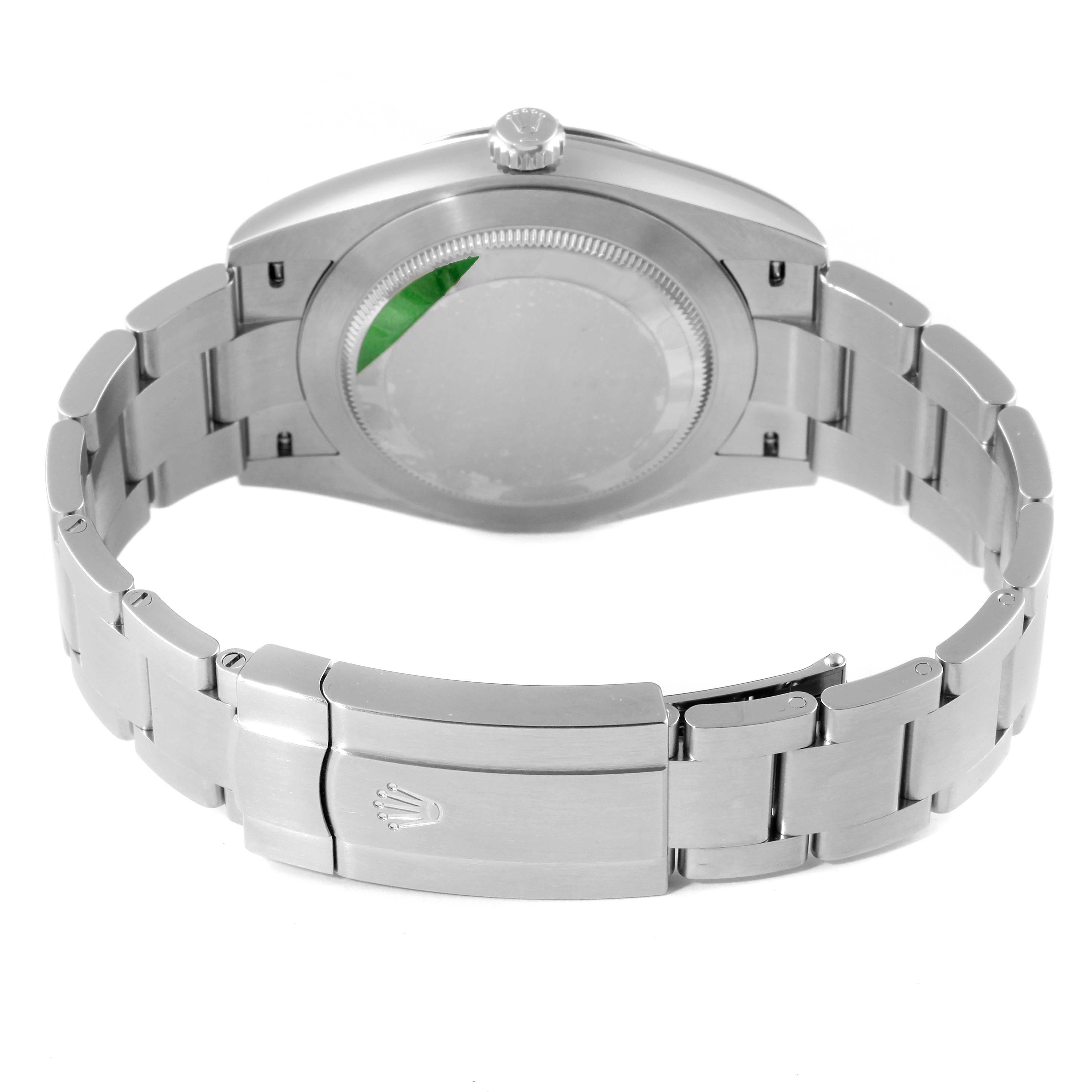 The image shows the back view of a Rolex Oyster Perpetual 124300 Men's Stainless Steel Silver Dial 124300 Men's Stainless Steel Silver Dial watch, highlighting the closed clasp and bracelet.