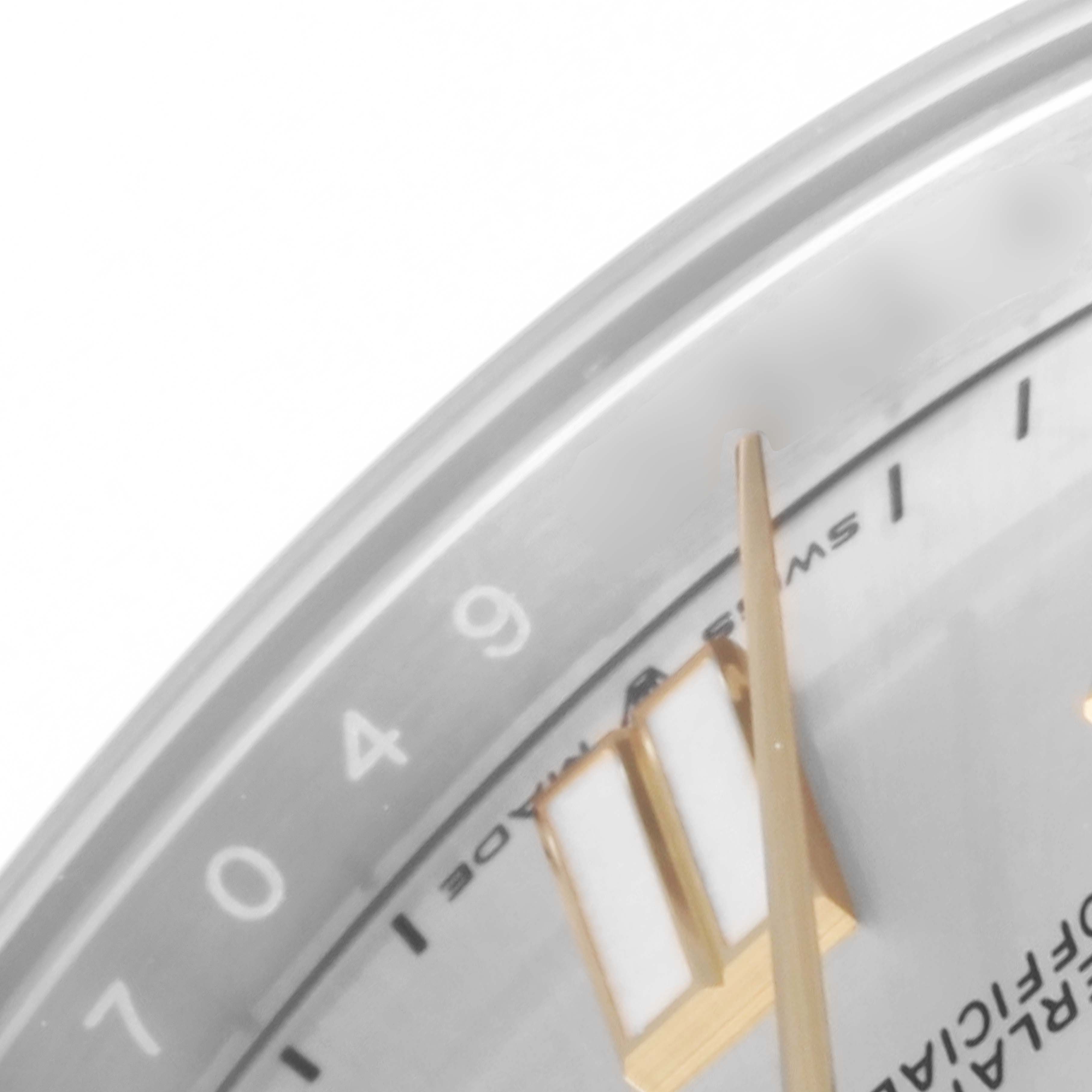 This is a close-up of a Rolex Oyster Perpetual 124300 Men's Stainless Steel Silver Dial 124300 Men's Stainless Steel Silver Dial watch, showing part of the dial, hour markers, and the hands.