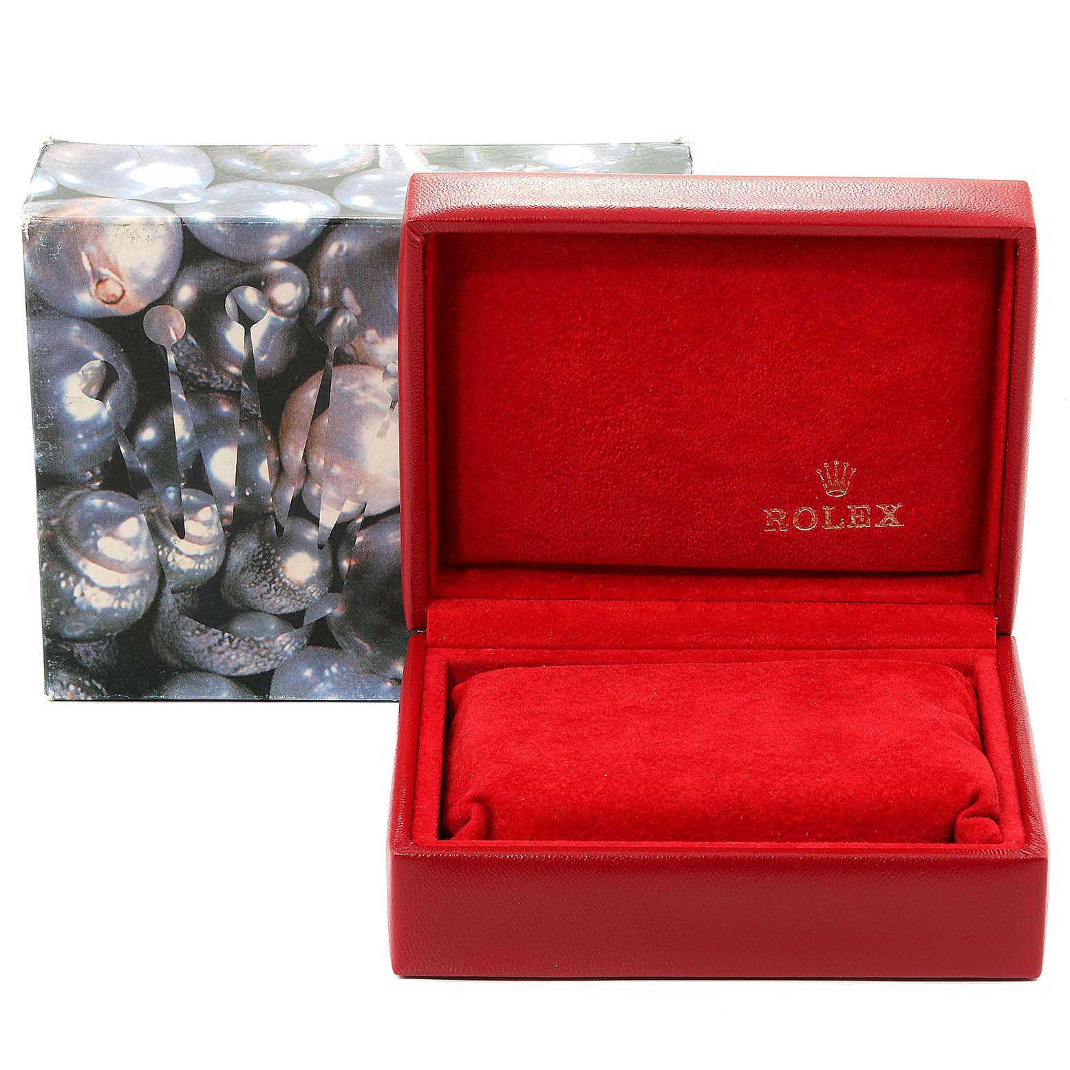 The image shows a red Rolex watch box for the Oyster Perpetual model, open with no watch inside.