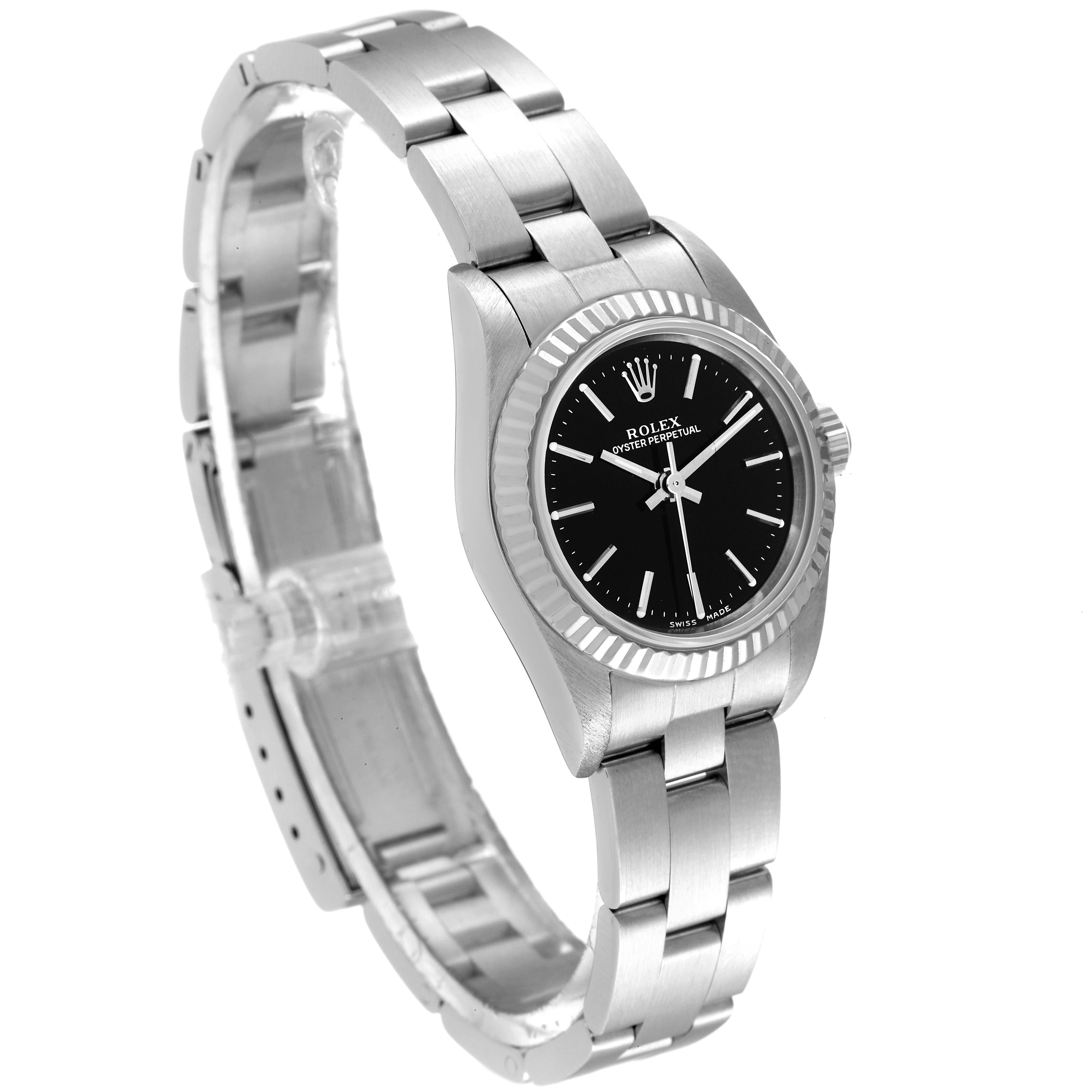 The Rolex Oyster Perpetual 76094 Women's Stainless Steel Black Dial 76094 Women's Stainless Steel Black Dial watch is shown at an angle highlighting the face, bezel, and part of the bracelet.
