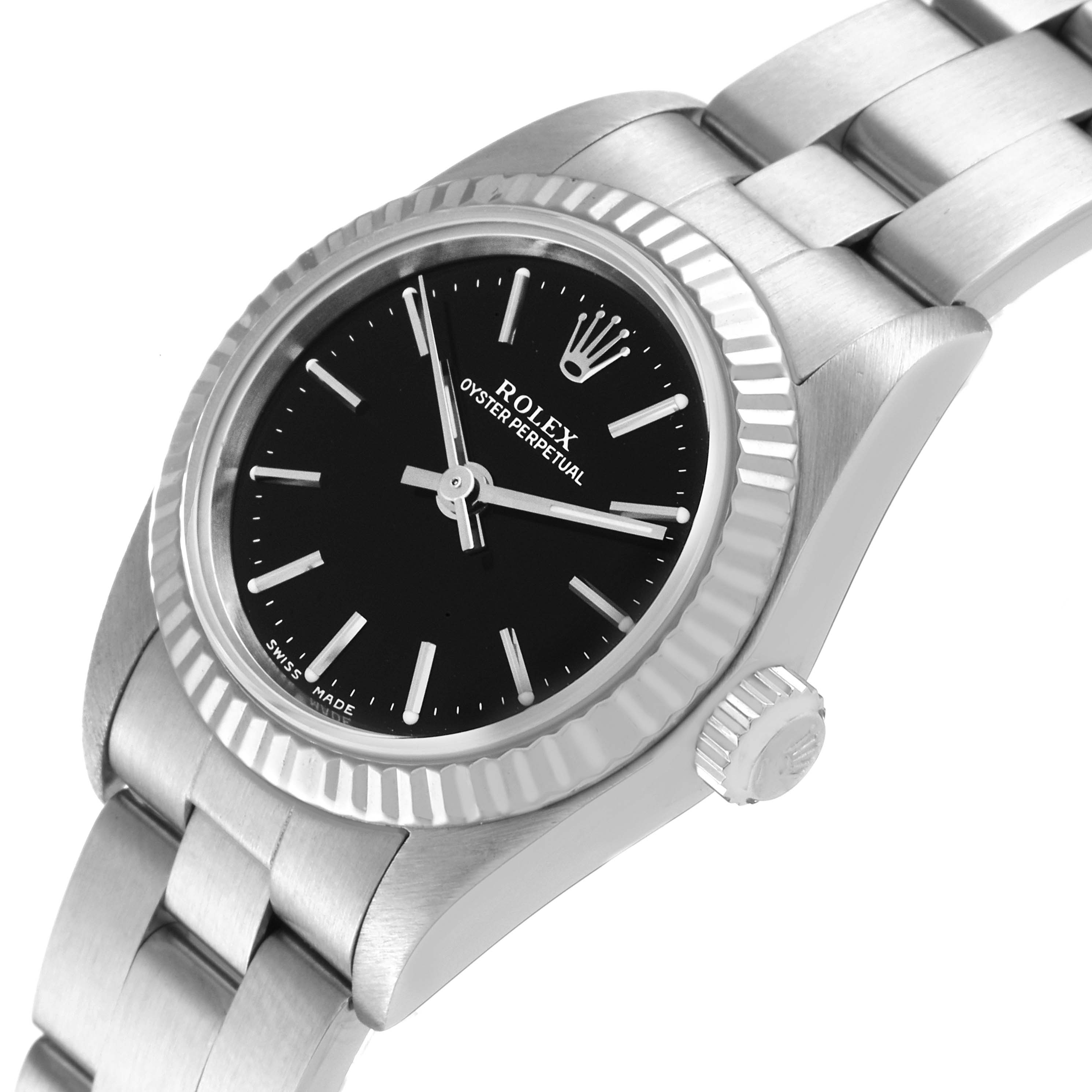 The Rolex Oyster Perpetual 76094 Women's Stainless Steel Black Dial 76094 Women's Stainless Steel Black Dial watch is shown at an angled close-up, highlighting the dial, bezel, and part of the bracelet.