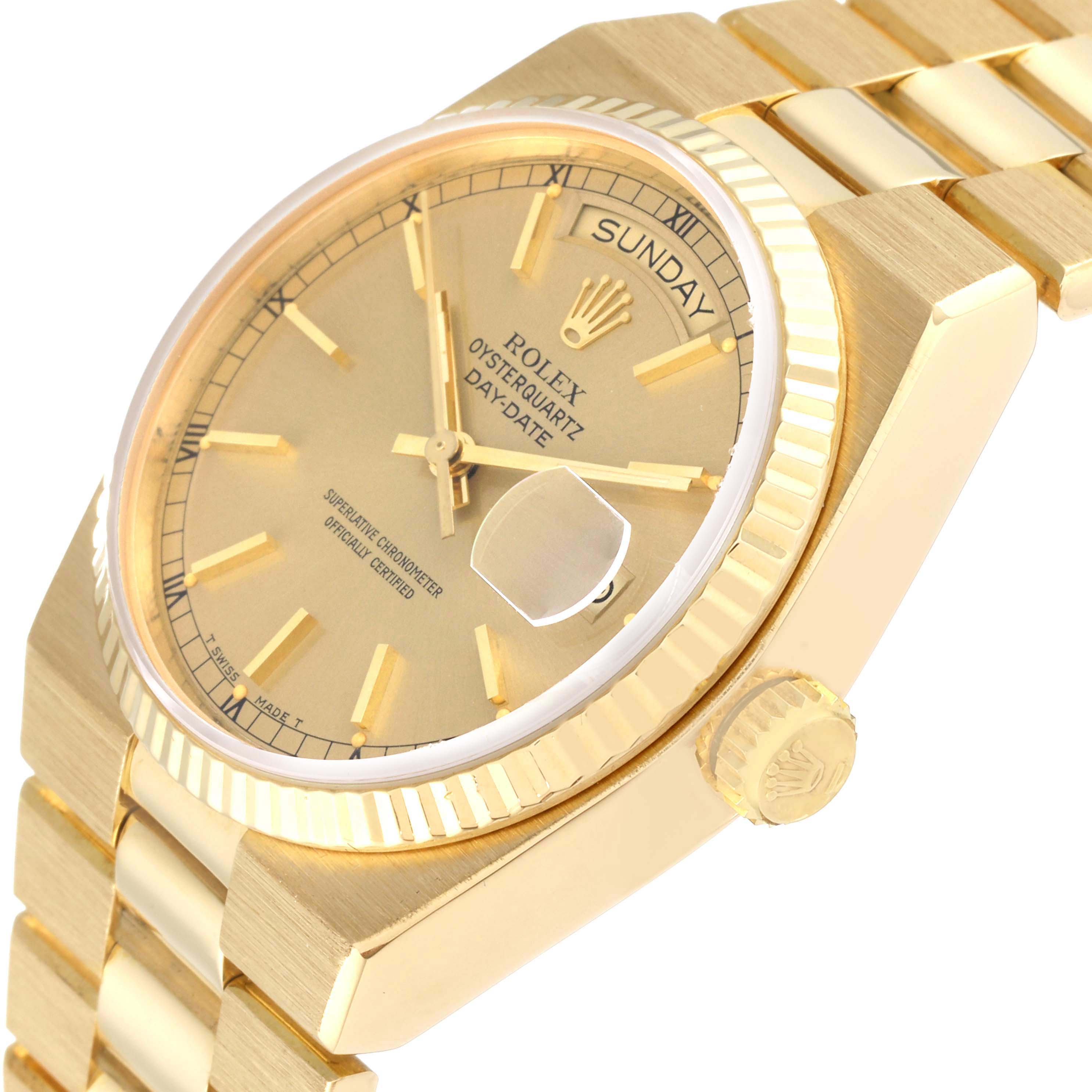 The photo shows a side angle of a Rolex Oysterquartz 19018 Men
s Yellow Gold Champagne Dial 19018 Men
s Yellow Gold Champagne Dial Day-Date watch, highlighting the dial, bezel, crown, and part of the bracelet.