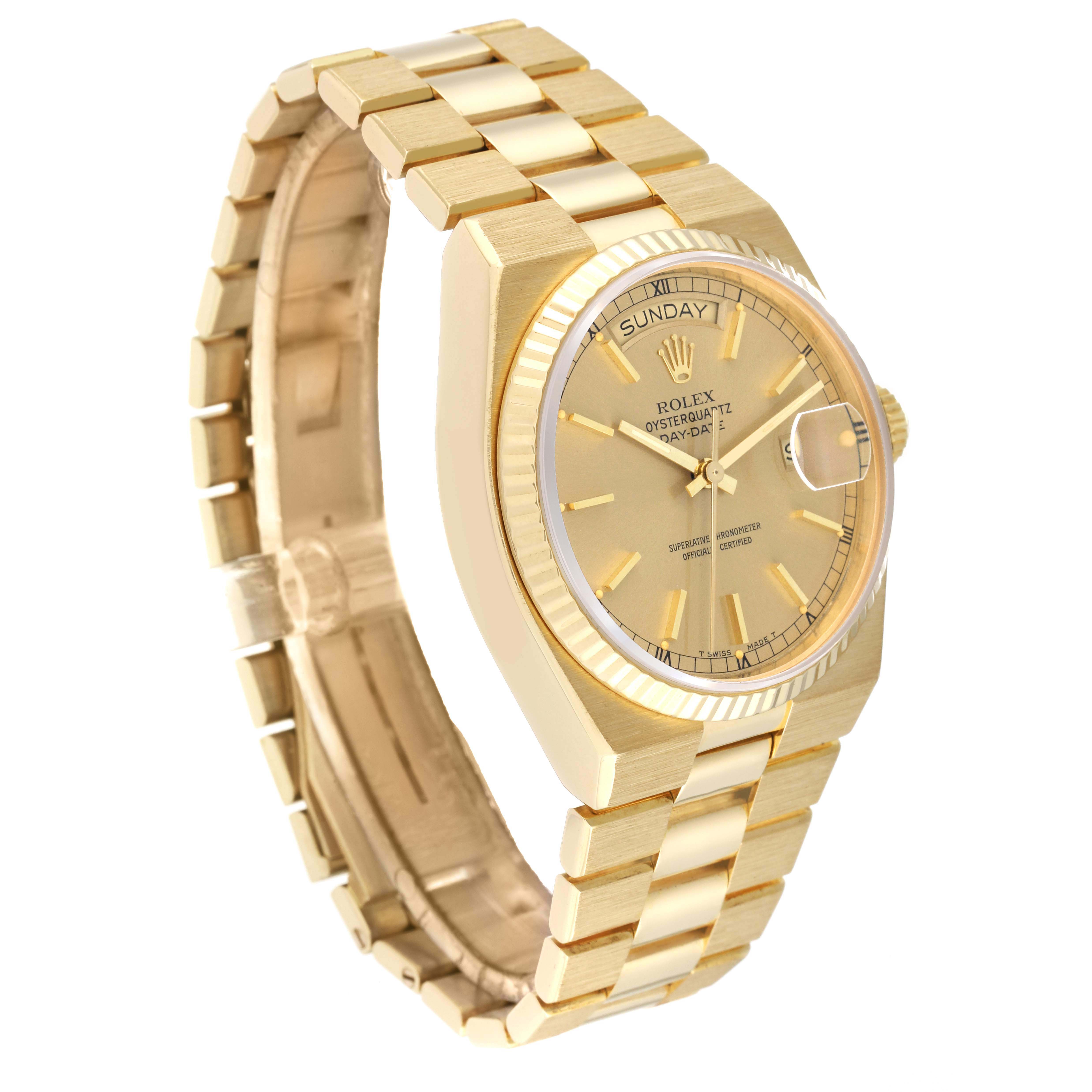 This image shows a side angle of the Rolex Oysterquartz 19018 Men
s Yellow Gold Champagne Dial 19018 Men
s Yellow Gold Champagne Dial watch, highlighting the gold bracelet, case, and champagne dial with day and date display.