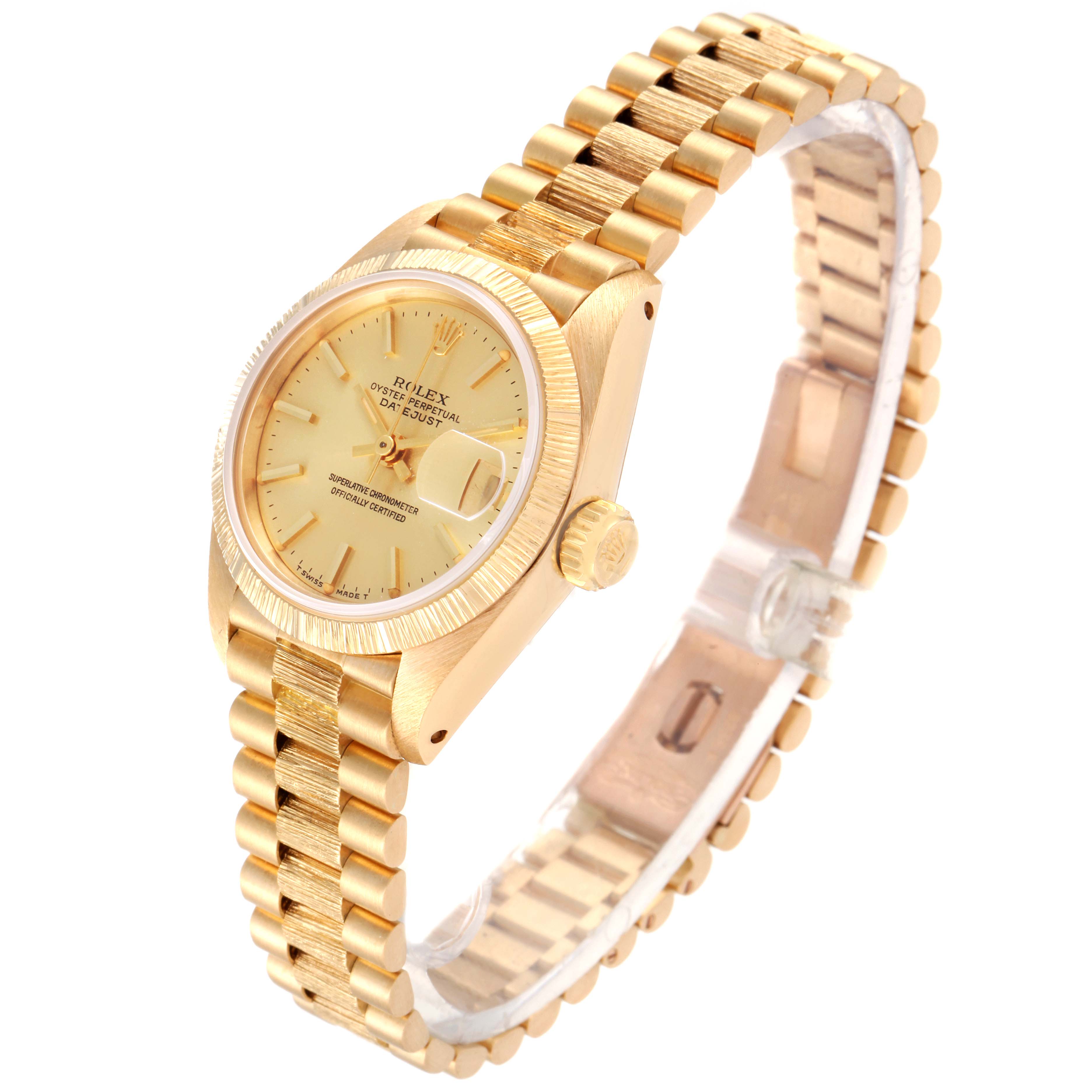 This image shows a Rolex President 69278 Women
s Yellow Gold Champagne Dial 69278 Women
s Yellow Gold Champagne Dial model watch at an angled view, featuring the dial, bezel, crown, and part of the bracelet.