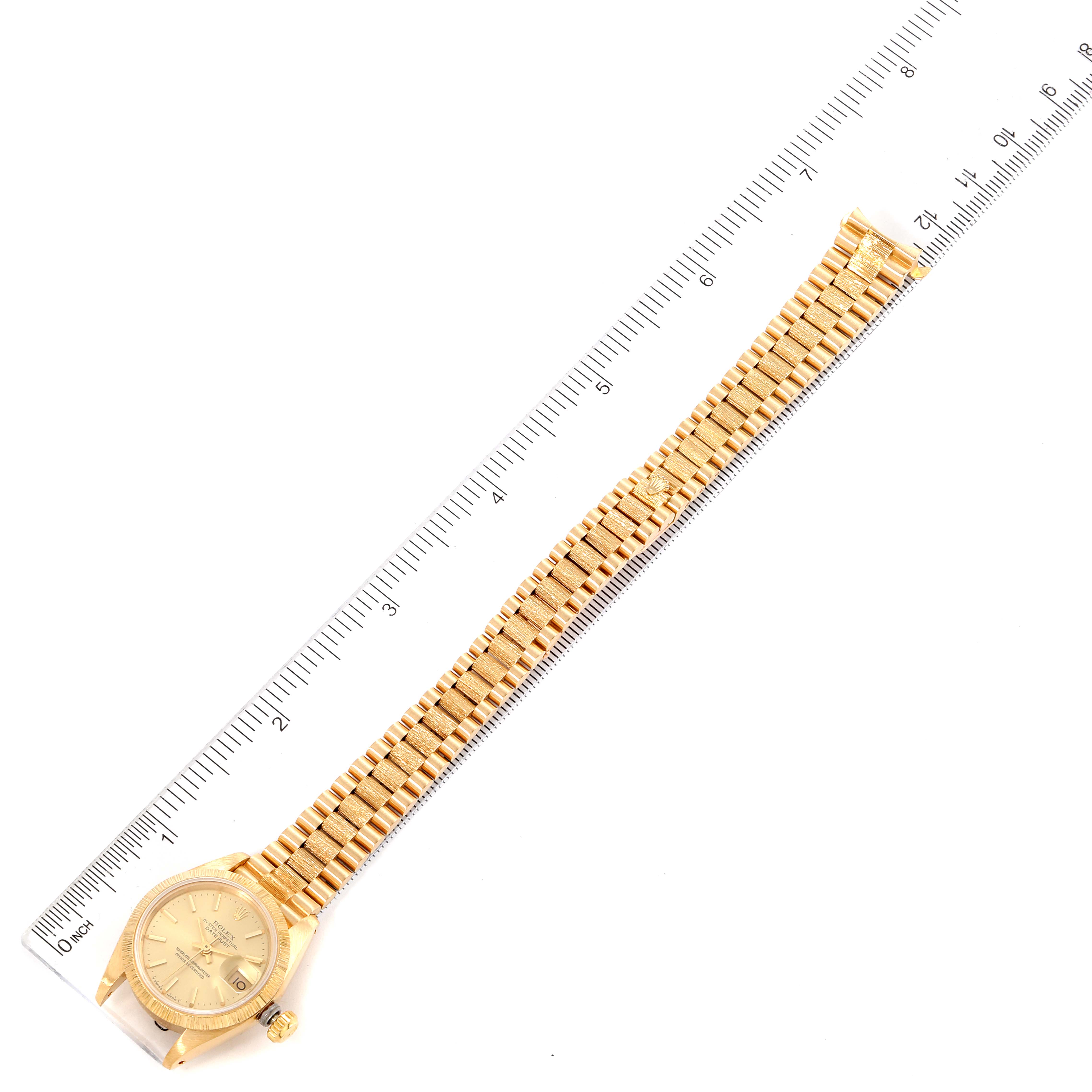 The image shows a Rolex President 69278 Women
s Yellow Gold Champagne Dial 69278 Women
s Yellow Gold Champagne Dial model watch laid flat with the full bracelet and dial visible.