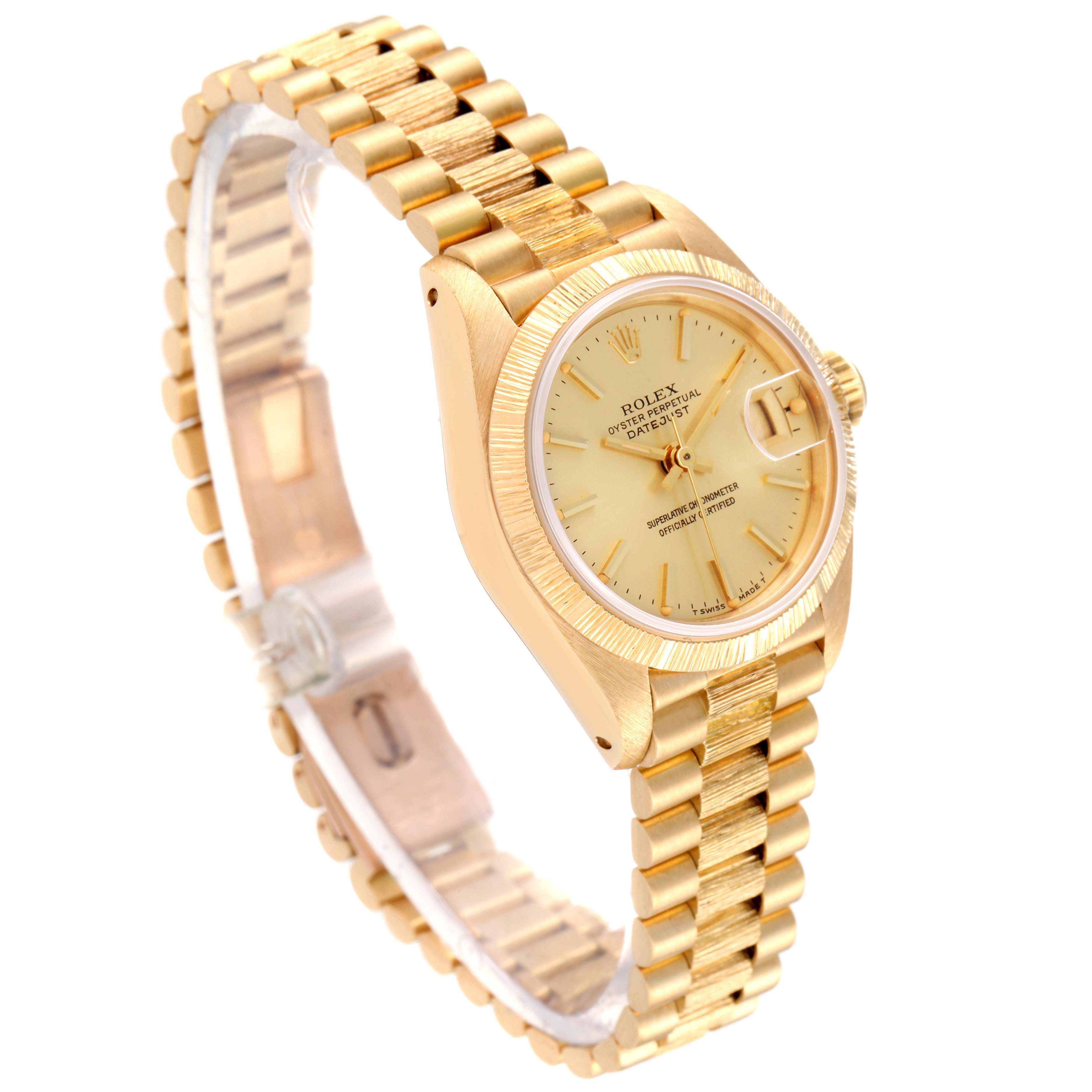 The image shows a gold Rolex President 69278 Women
s Yellow Gold Champagne Dial 69278 Women
s Yellow Gold Champagne Dial model watch at a three-quarter angle, highlighting its face, bezel, and President bracelet.