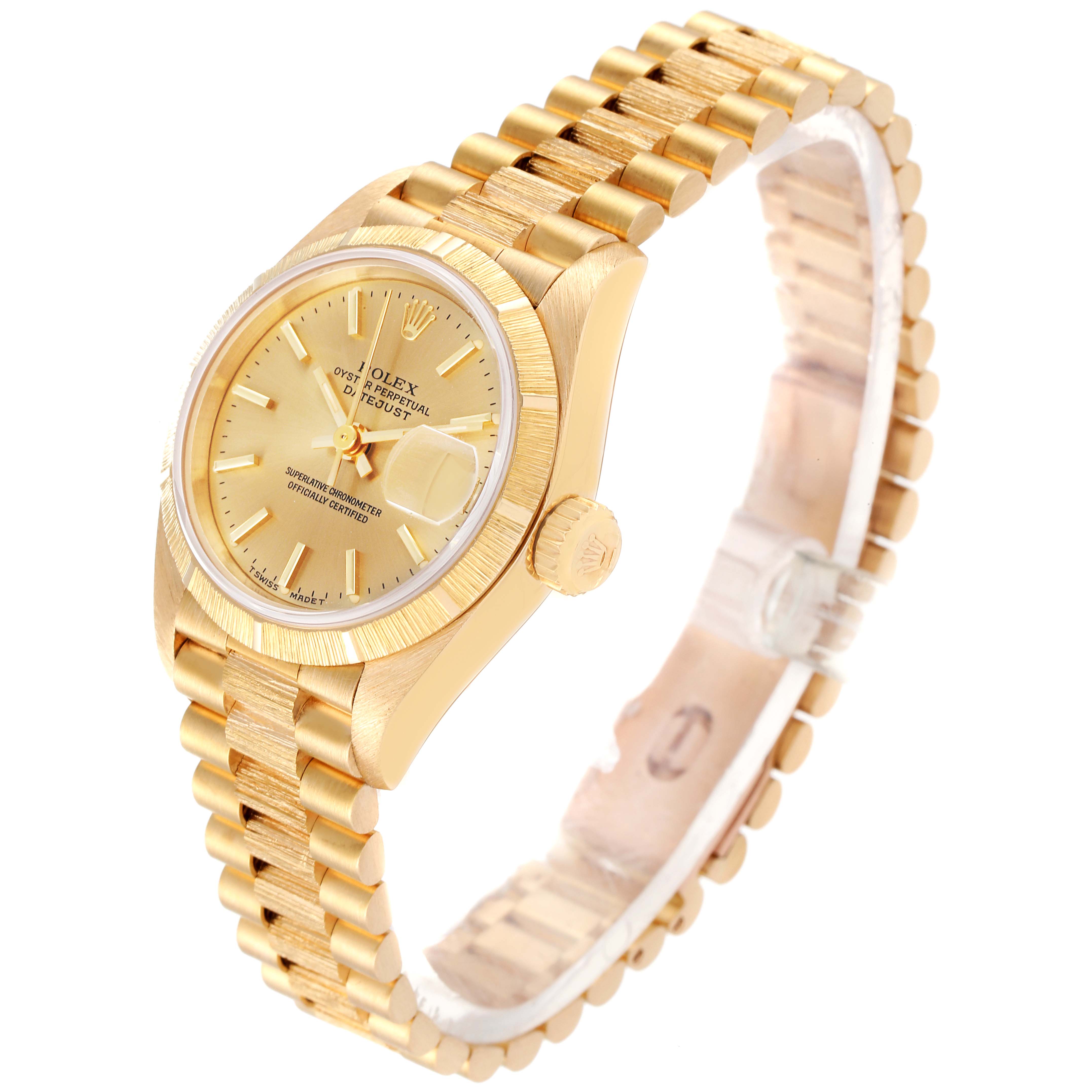The Rolex President 69278 Women's Yellow Gold Champagne Dial 69278 Women's Yellow Gold Champagne Dial watch is shown from an angle highlighting the face, bracelet, and crown.