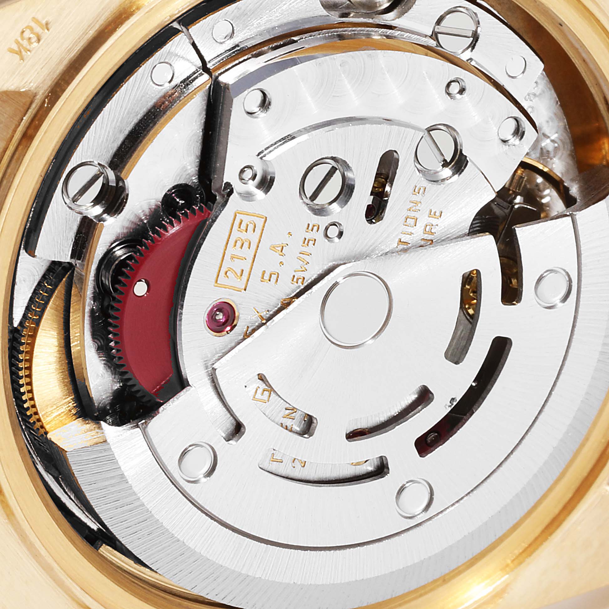 This image shows the intricate internal mechanical movement of the President model by Rolex, viewed from the back of the watch.