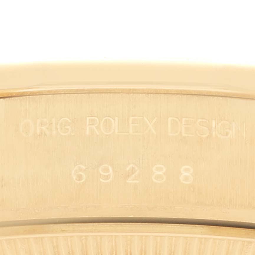 The image shows the side of a Rolex President 69288 Women's Yellow Gold Champagne Dial 69288 Women's Yellow Gold Champagne Dial watch, displaying the engraved text "ORG. ROLEX DESIGN" and the model number "69288."