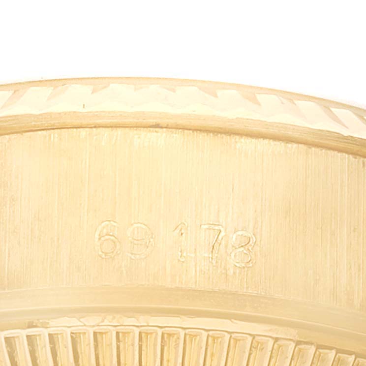 The image shows a close-up view of the case side and bezel of a Rolex President 69178 Women's Yellow Gold Champagne Dial 69178 Women's Yellow Gold Champagne Dial model with model number 69178.