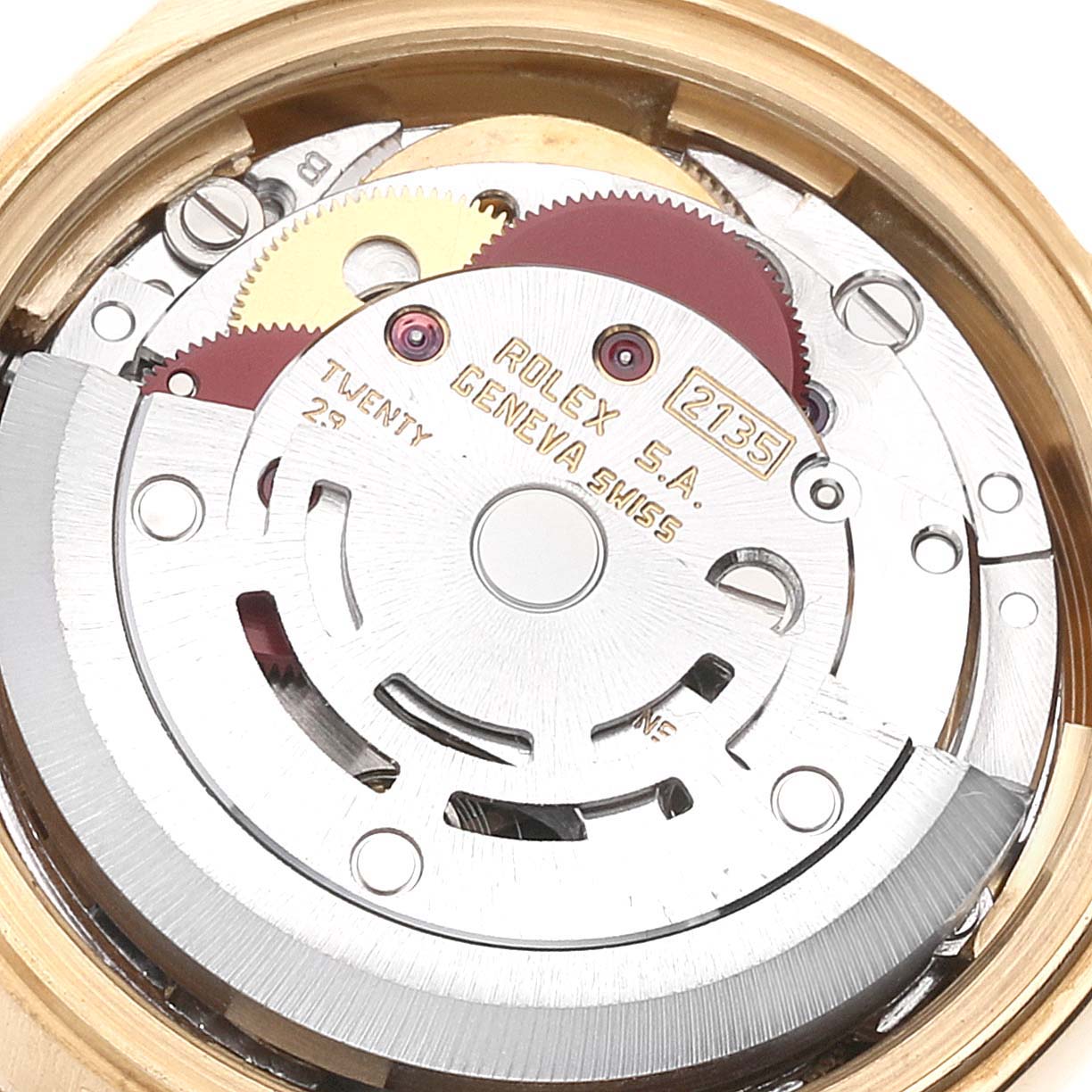 This image shows an up-close view of the movement mechanism of a Rolex President 69178 Women's Yellow Gold Champagne Dial 69178 Women's Yellow Gold Champagne Dial model watch, highlighting its intricate gears and components.