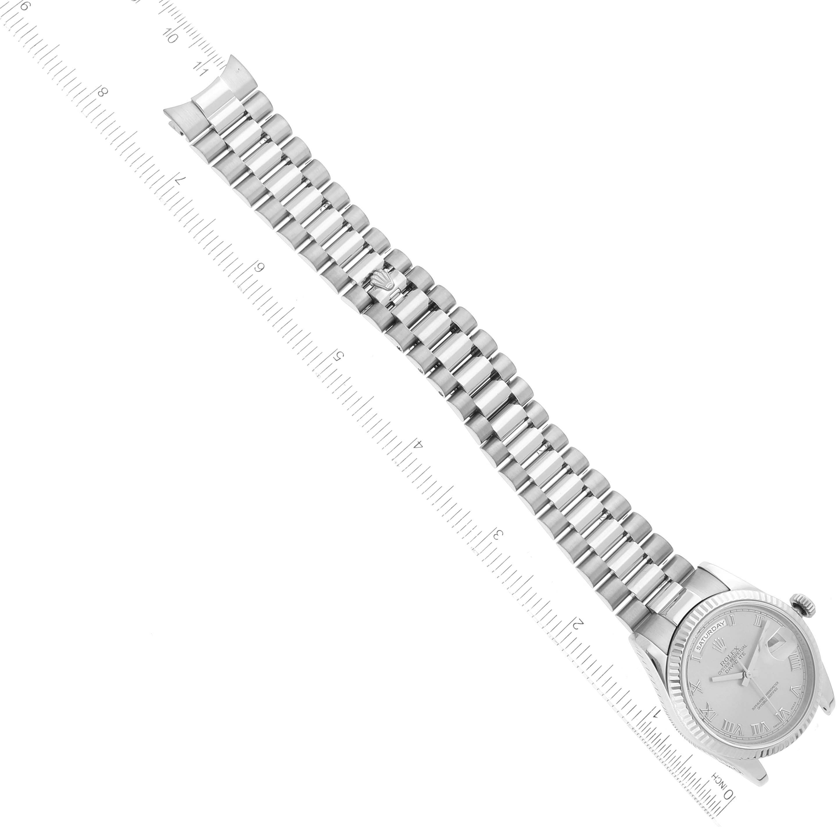 The image shows a Rolex President 118239 Men's White Gold Silver Dial 118239 Men's White Gold Silver Dial watch laying flat with its bracelet extended and a ruler adjacent for scale.