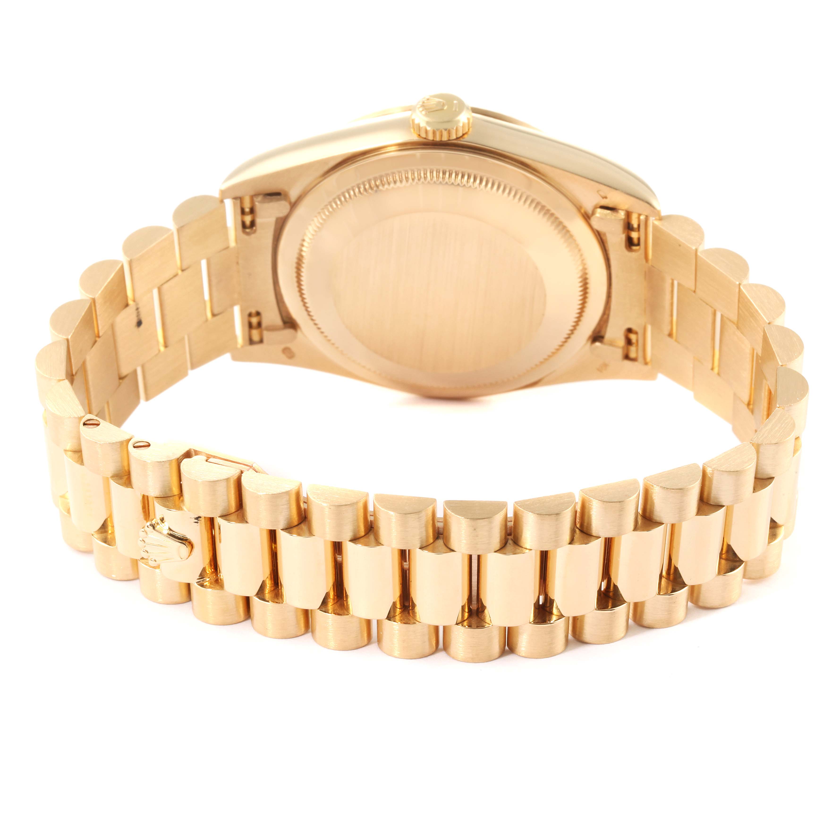 The image shows the back of the Rolex President 18238 Men
s Yellow Gold Champagne Dial 18238 Men
s Yellow Gold Champagne Dial watch and its gold bracelet, featuring the clasp and case.