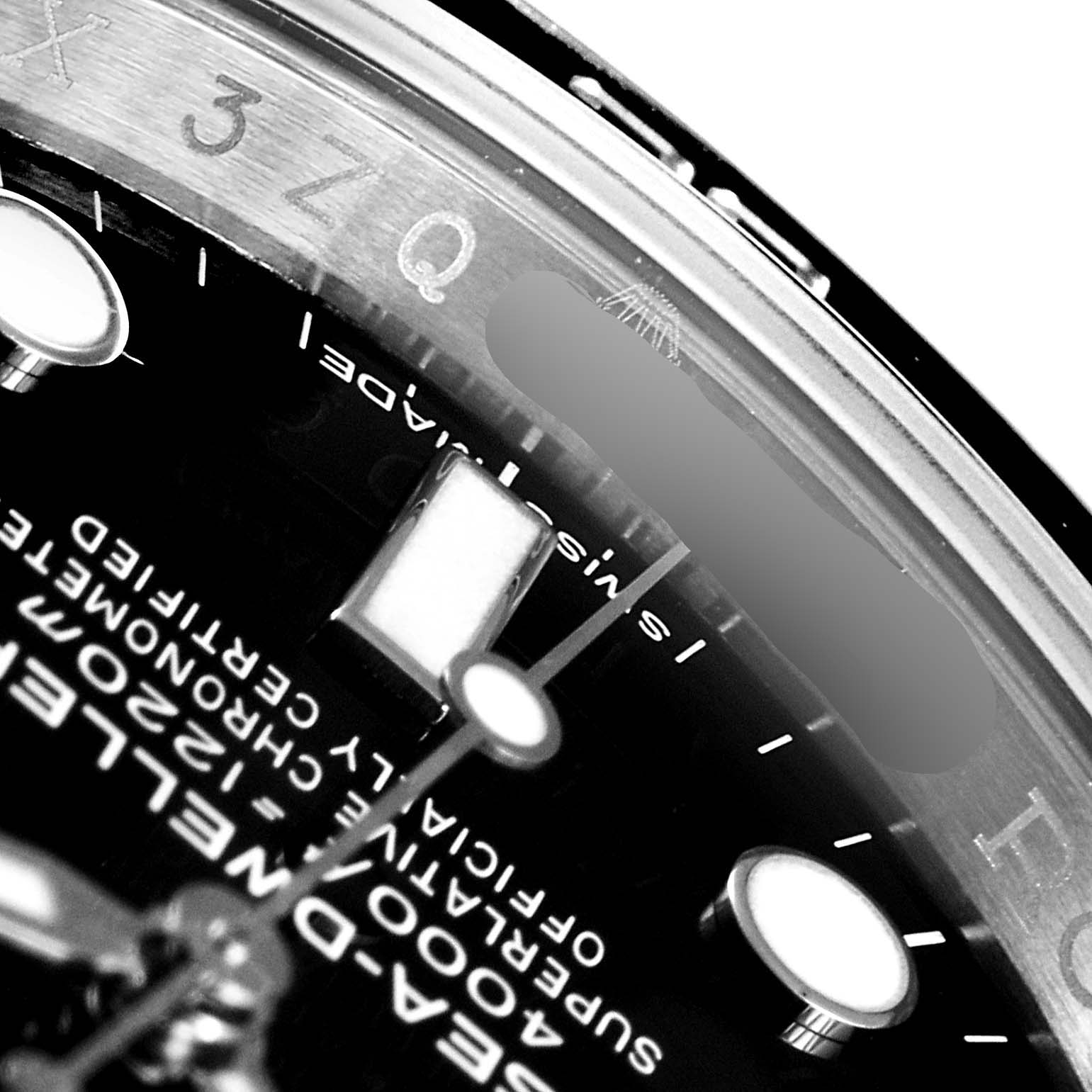 This close-up angle of a Rolex Sea-Dweller 116600 Men
s Stainless Steel Black Dial 116600 Men
s Stainless Steel Black Dial watch shows parts of the dial and inner bezel with some lettering.