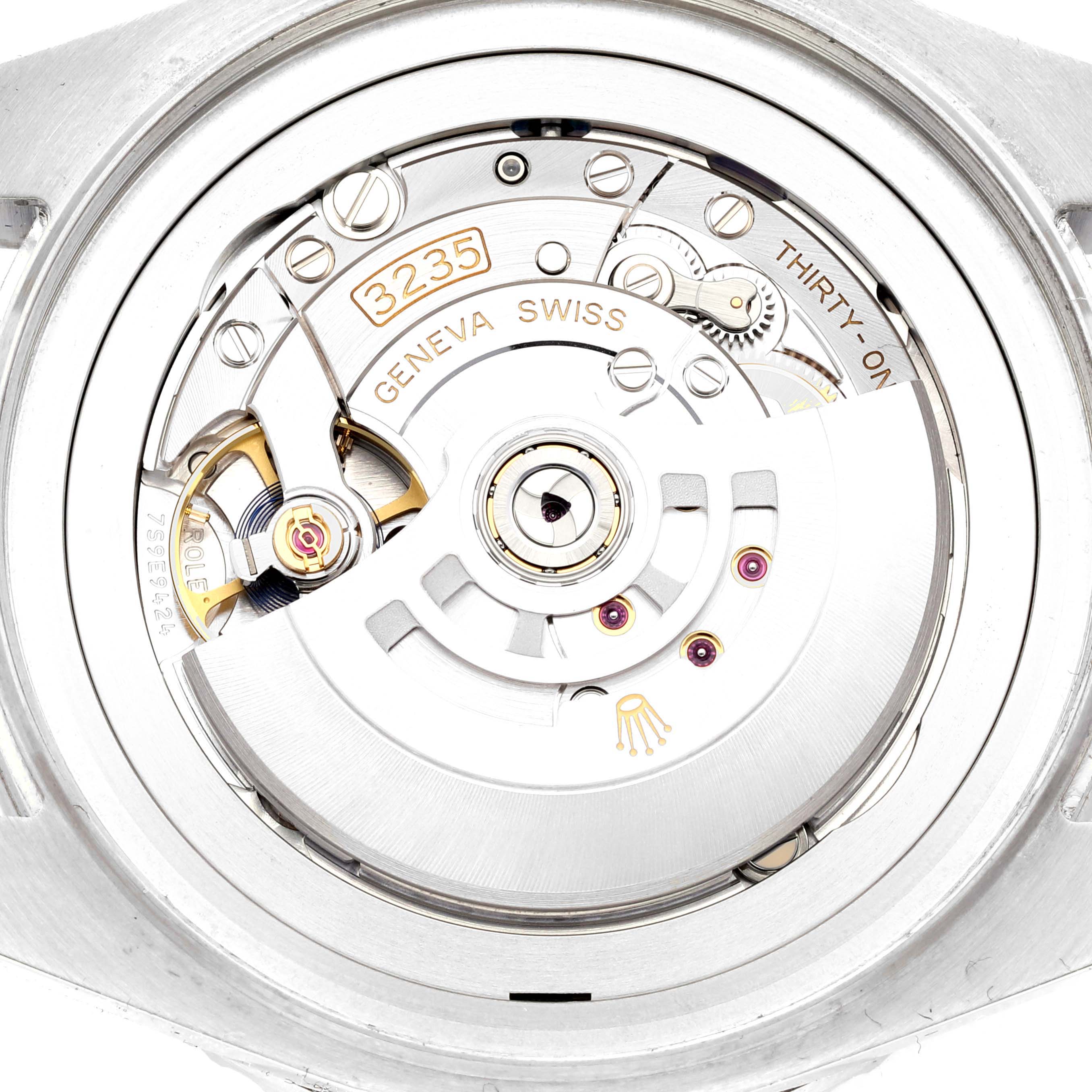 This image shows the movement and internal mechanisms of a Rolex Sea-Dweller 126660 Men
s Stainless Steel Blue Dial 126660 Men
s Stainless Steel Blue Dial watch from a rear angle.