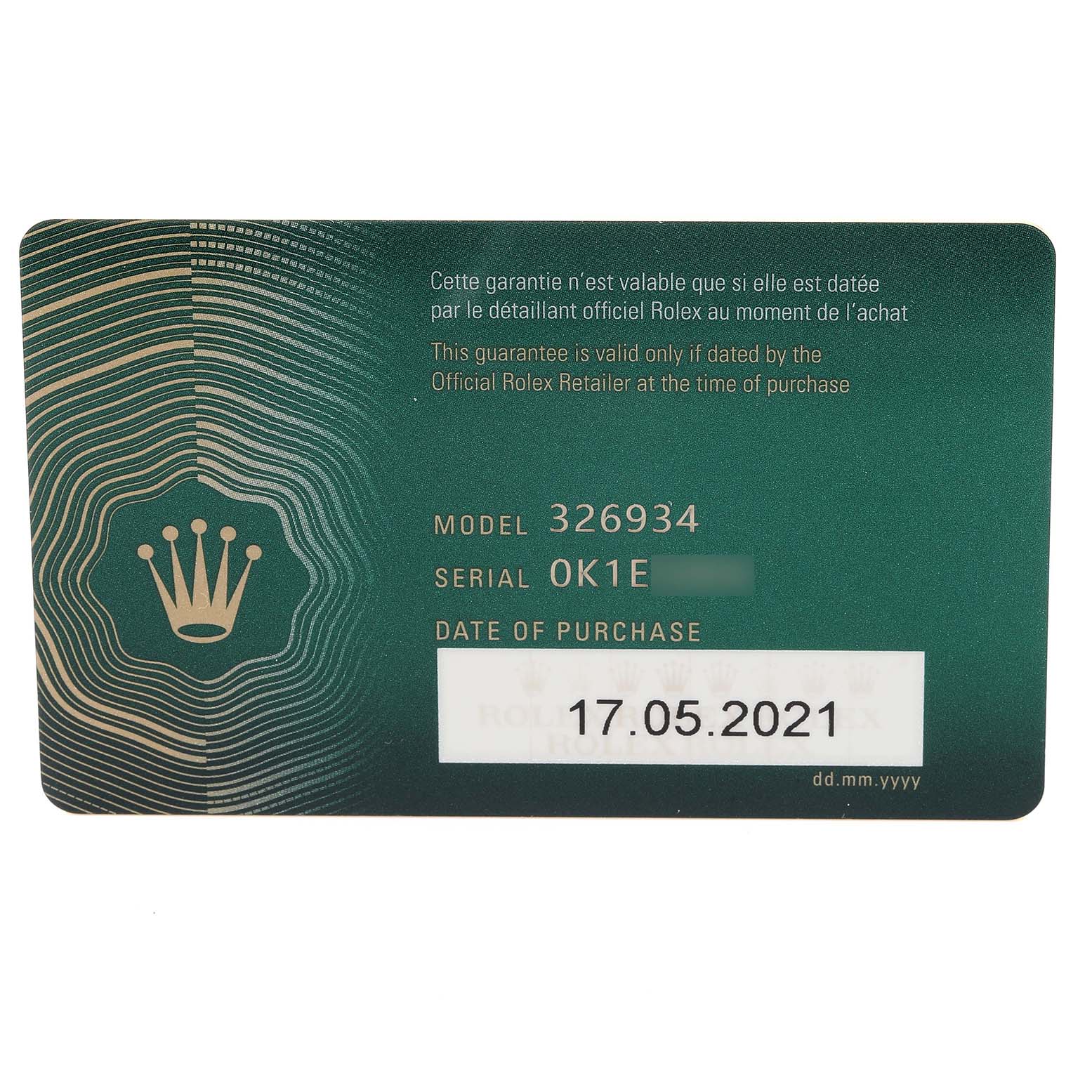 This image shows a warranty card for the Sky-Dweller model by Rolex with the model number, serial number, and date of purchase.