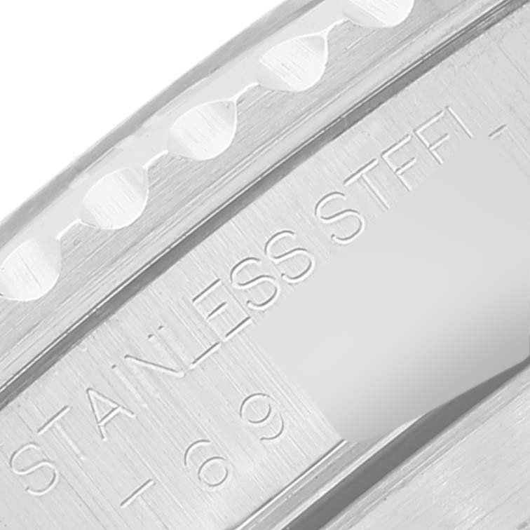 This close-up image shows the engraved markings on the stainless steel case of a Rolex Submariner 14060 Men
s Stainless Steel Black Dial 14060 Men
s Stainless Steel Black Dial watch.