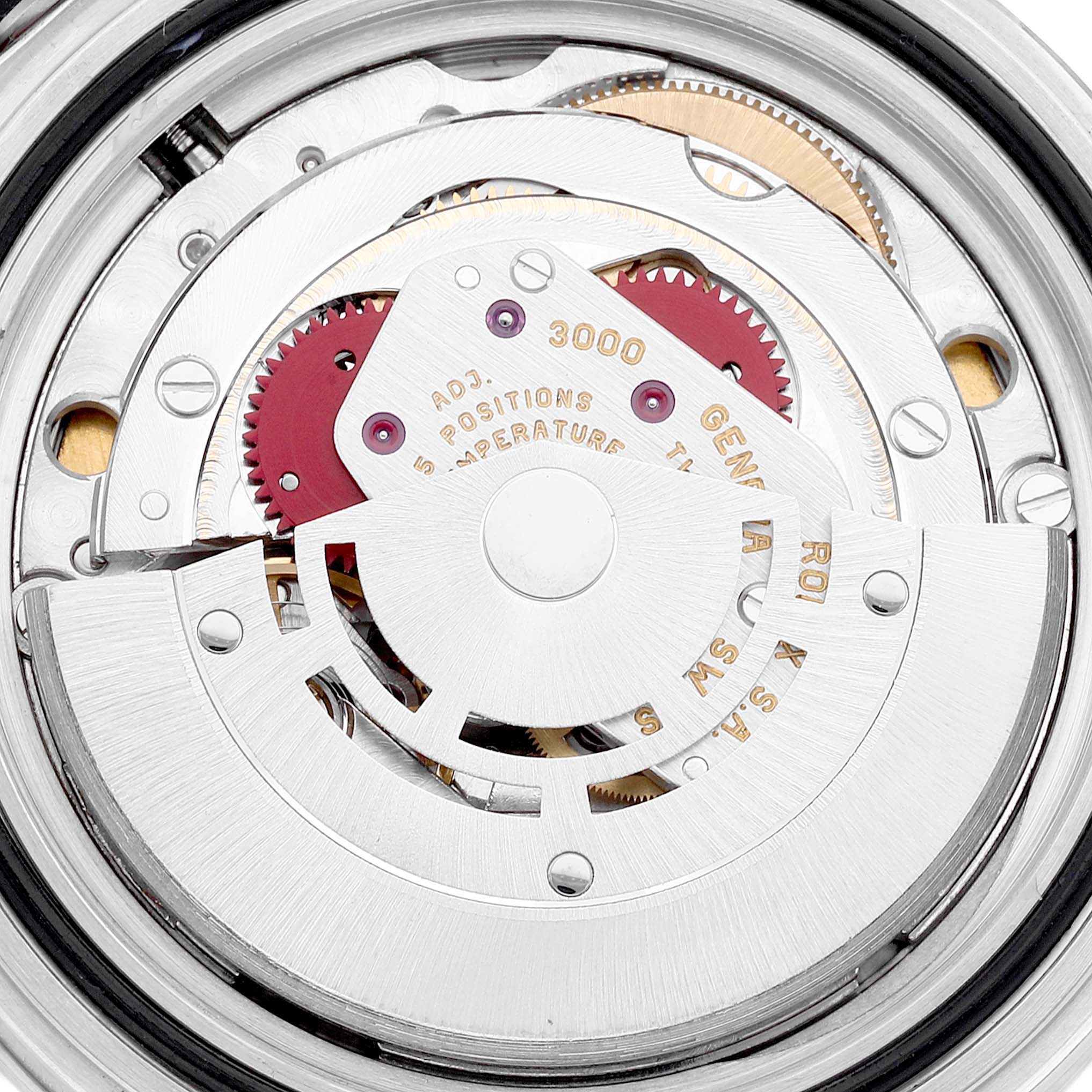 This image shows the intricate internal movement mechanisms of a Rolex Submariner 14060 Men
s Stainless Steel Black Dial 14060 Men
s Stainless Steel Black Dial watch from a macro angle.