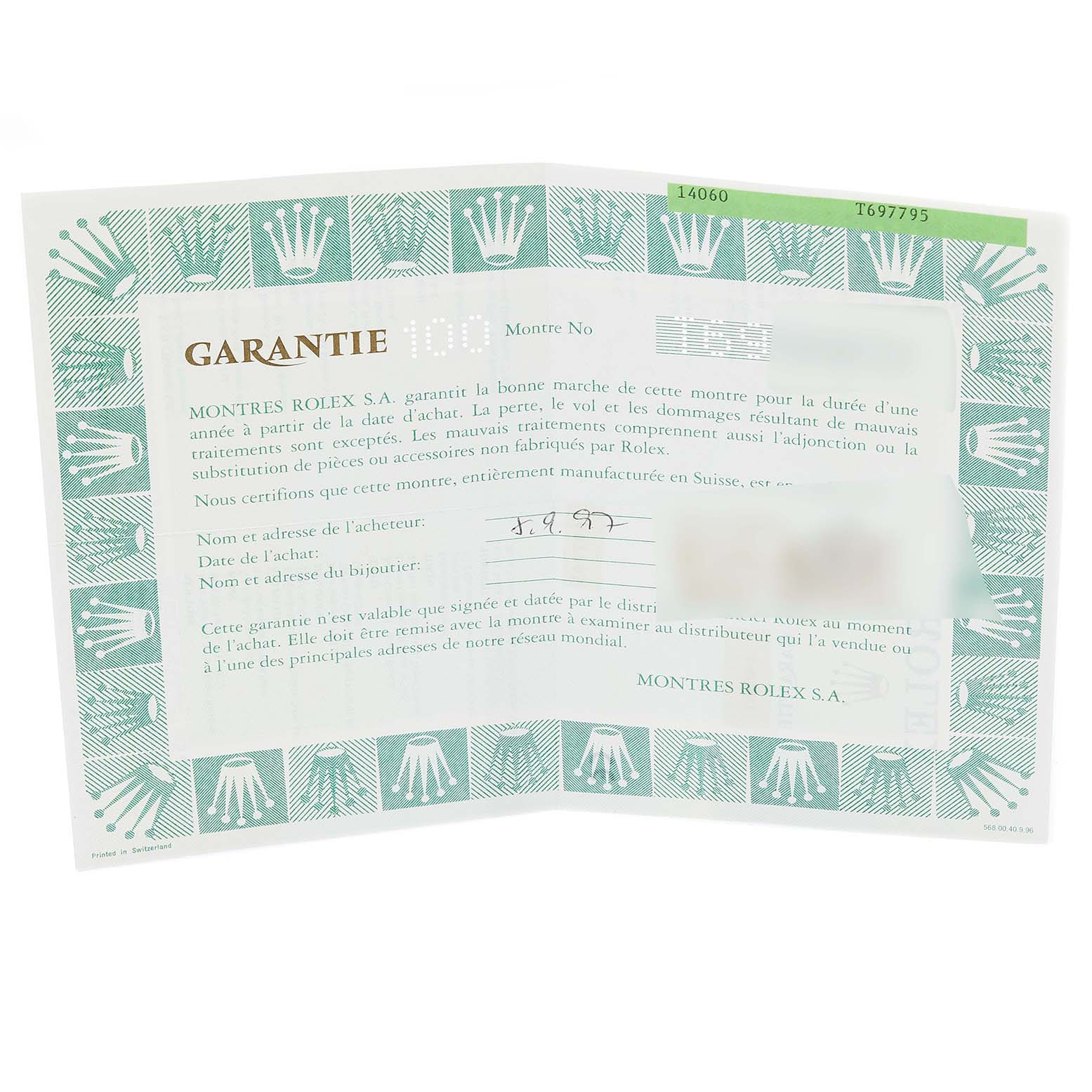 The image shows a warranty card for the Rolex Submariner 14060 Men
s Stainless Steel Black Dial 14060 Men
s Stainless Steel Black Dial model, displaying text and logos.