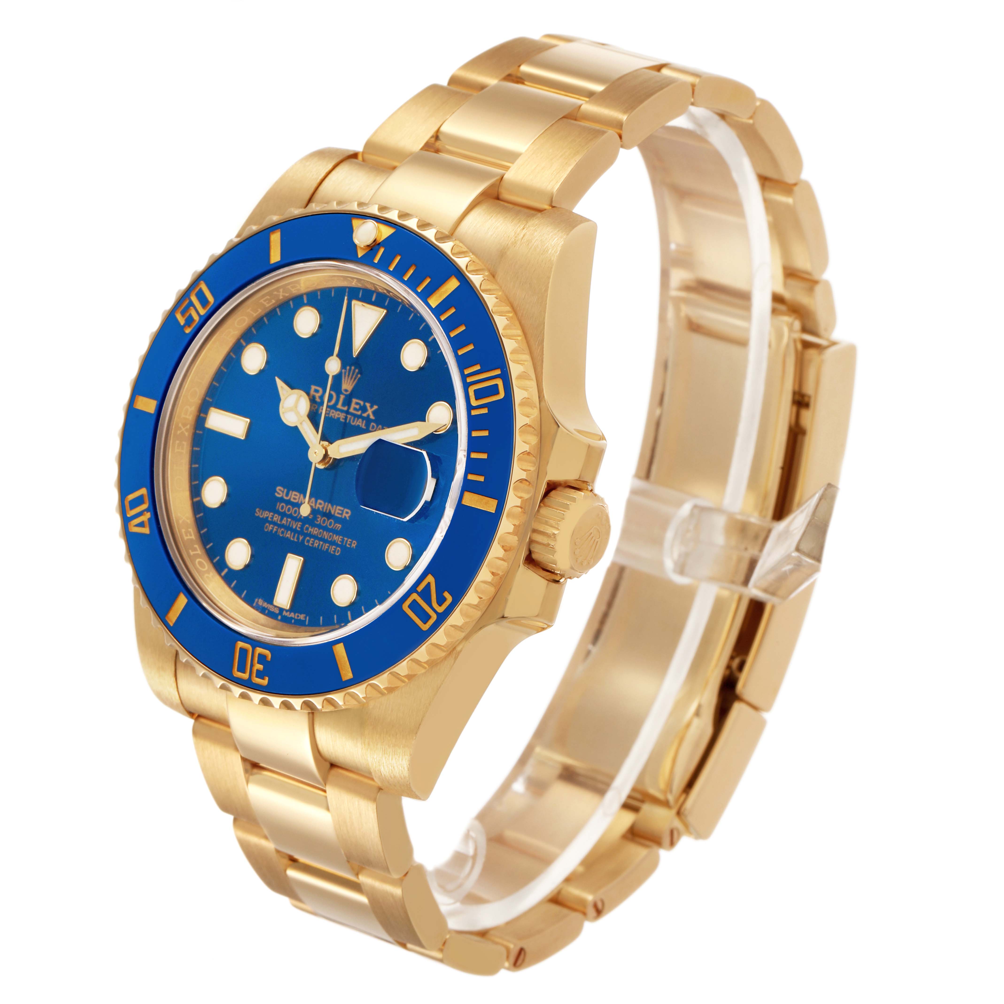 The Rolex Submariner 116618 Men's Yellow Gold Blue Dial is shown at a three-quarter angle, highlighting the blue dial, bezel, and gold bracelet.