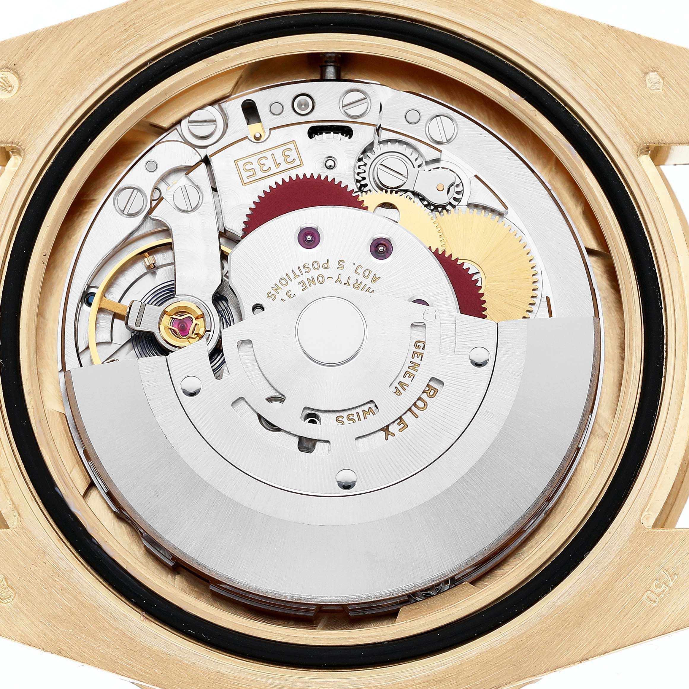 The image shows the movement of the Rolex Submariner 116618 Men's Yellow Gold Blue Dial watch viewed from the back, highlighting its intricate mechanical parts.