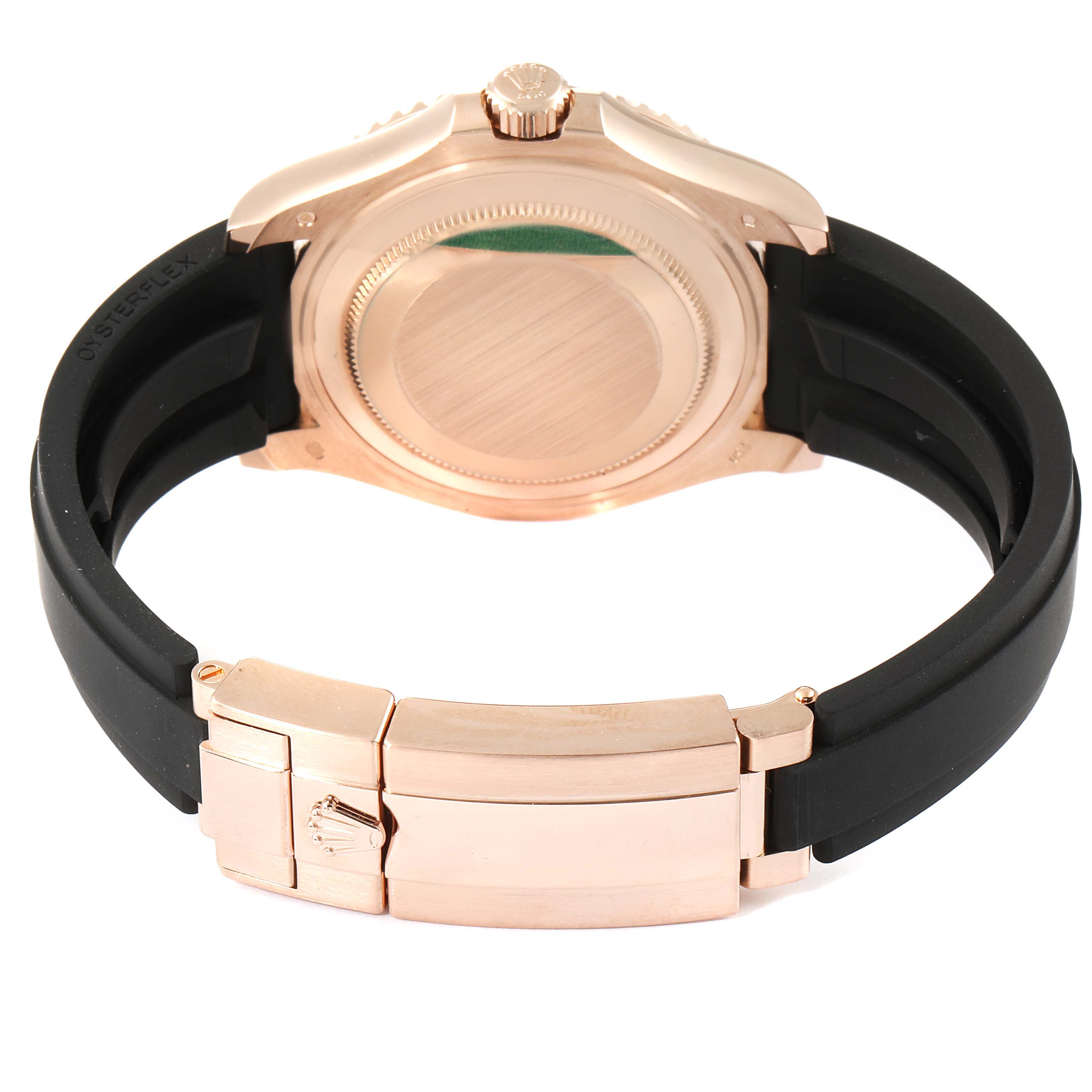 The image shows the back view and clasp of a Rolex Yacht-Master 268655 Men's Rose Gold Black Dial 268655 Men's Rose Gold Black Dial watch with a black strap and rose gold elements.
