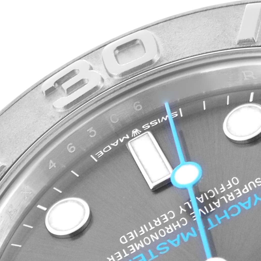 The image shows a close-up of the dial, bezel, and markers of a Rolex Yacht-Master 268622 Men
s Stainless Steel Silver Dial watch.