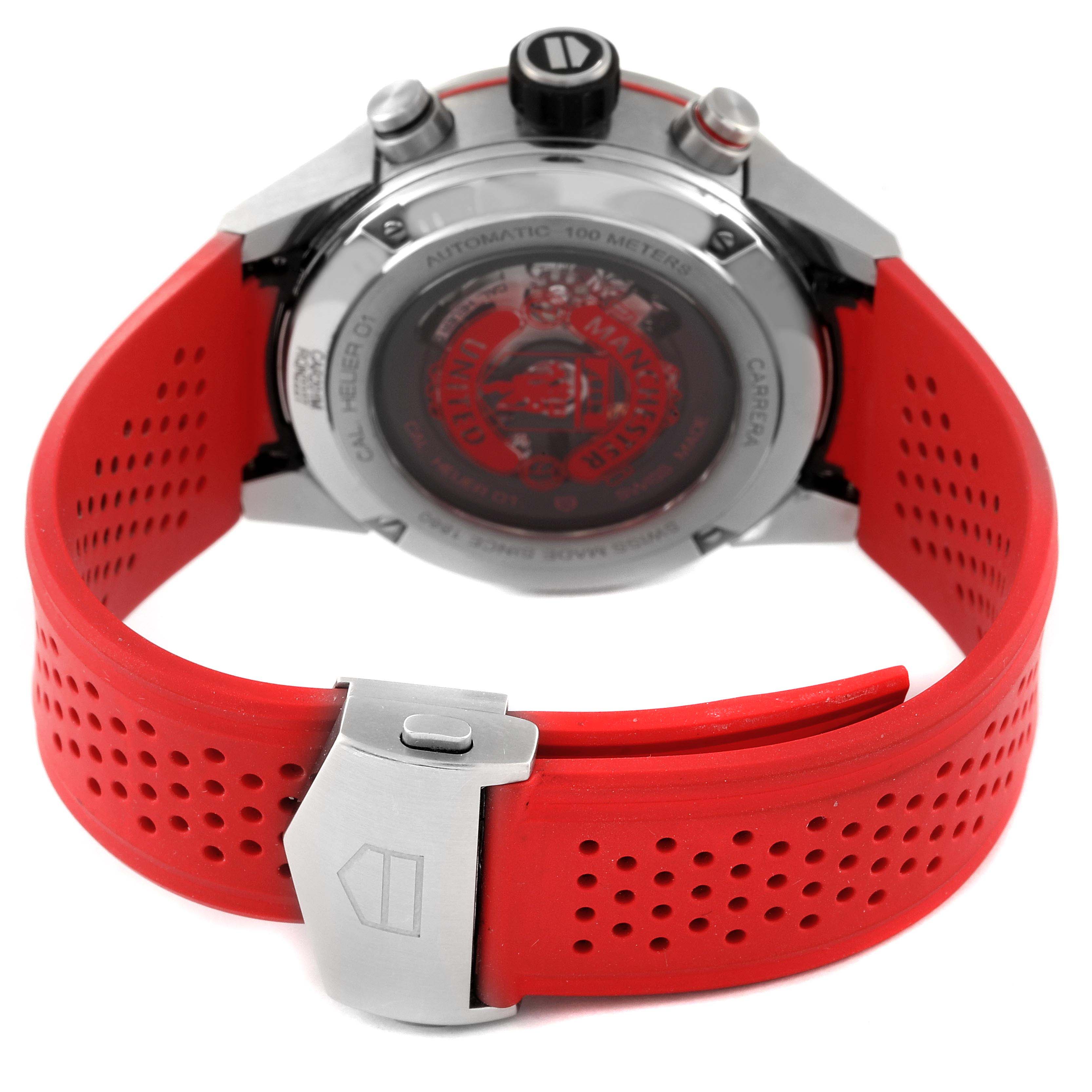 The image shows the back case and red strap of a Tag Heuer Carrera CAR201M.FT6156 Men's Stainless Steel Silver Dial CAR201M.FT6156 Men's Stainless Steel Silver Dial watch from a slightly elevated rear angle.