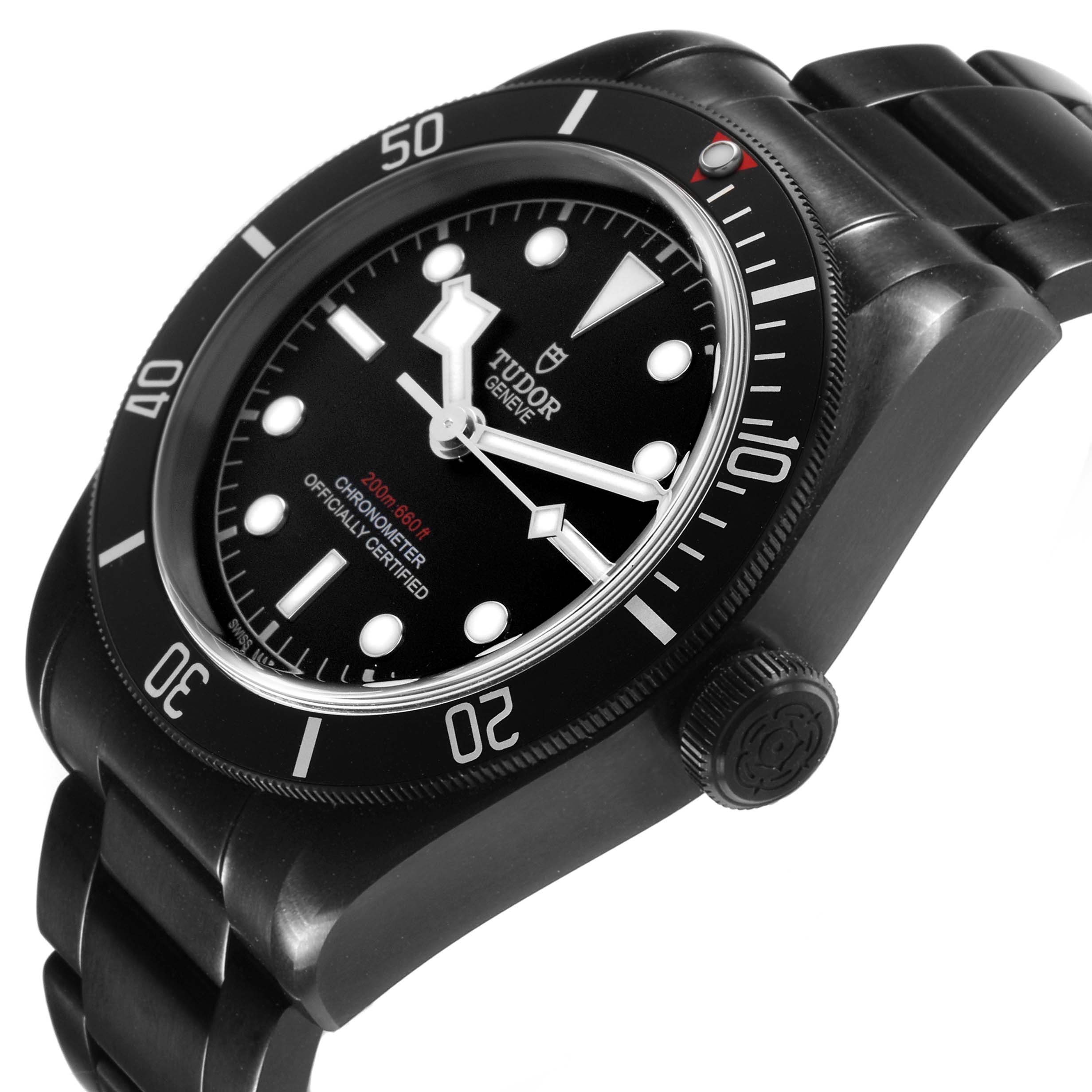 The Tudor Heritage Black Bay 79230DK Men's Stainless Steel Black Dial watch is shown from a three-quarter angle, featuring its bezel, crown, and part of the bracelet.