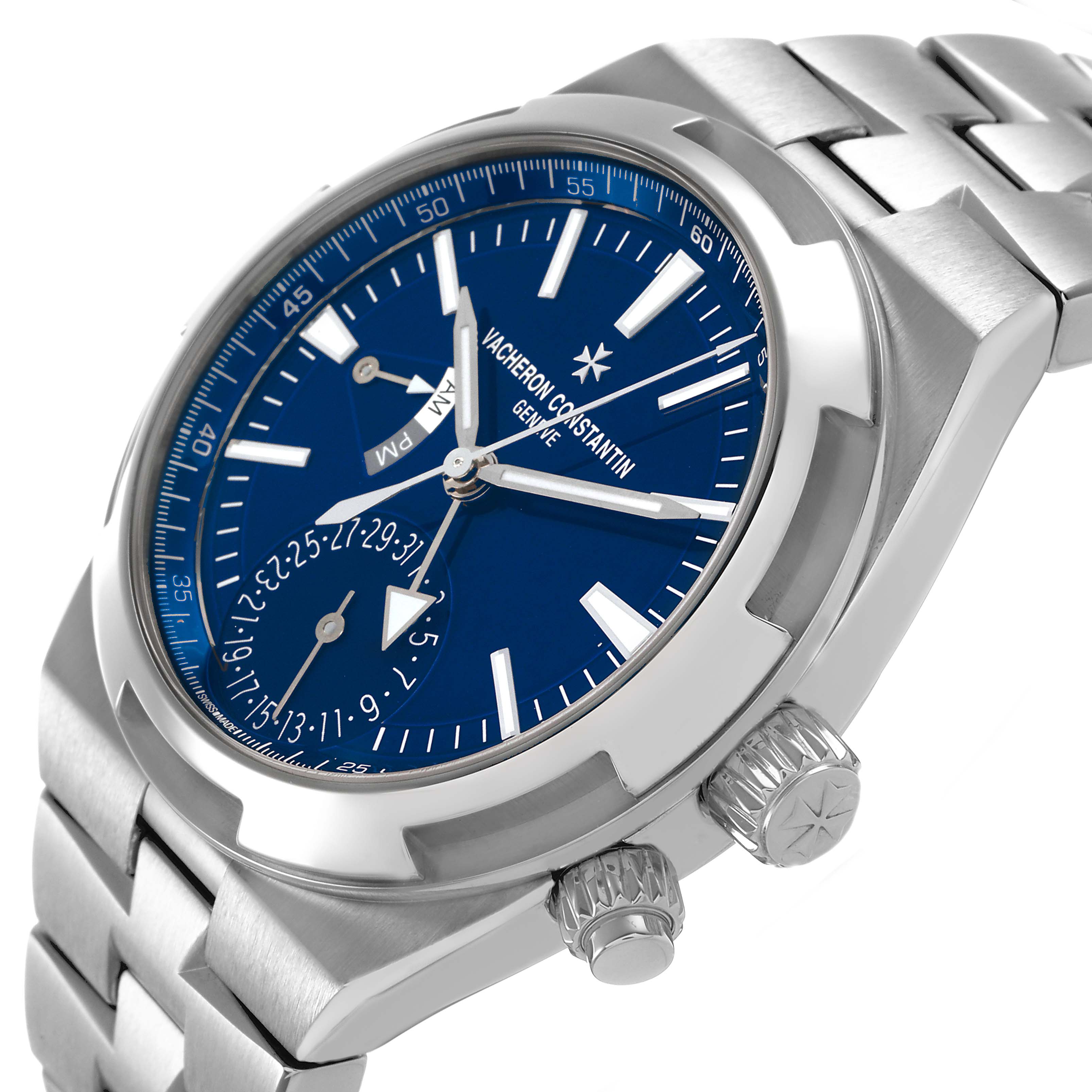 The Vacheron Constantin Overseas 7900V/110A-B334 Men's Stainless Steel Blue Dial watch is shown at an angled side view, highlighting its blue dial, bracelets, and crown.