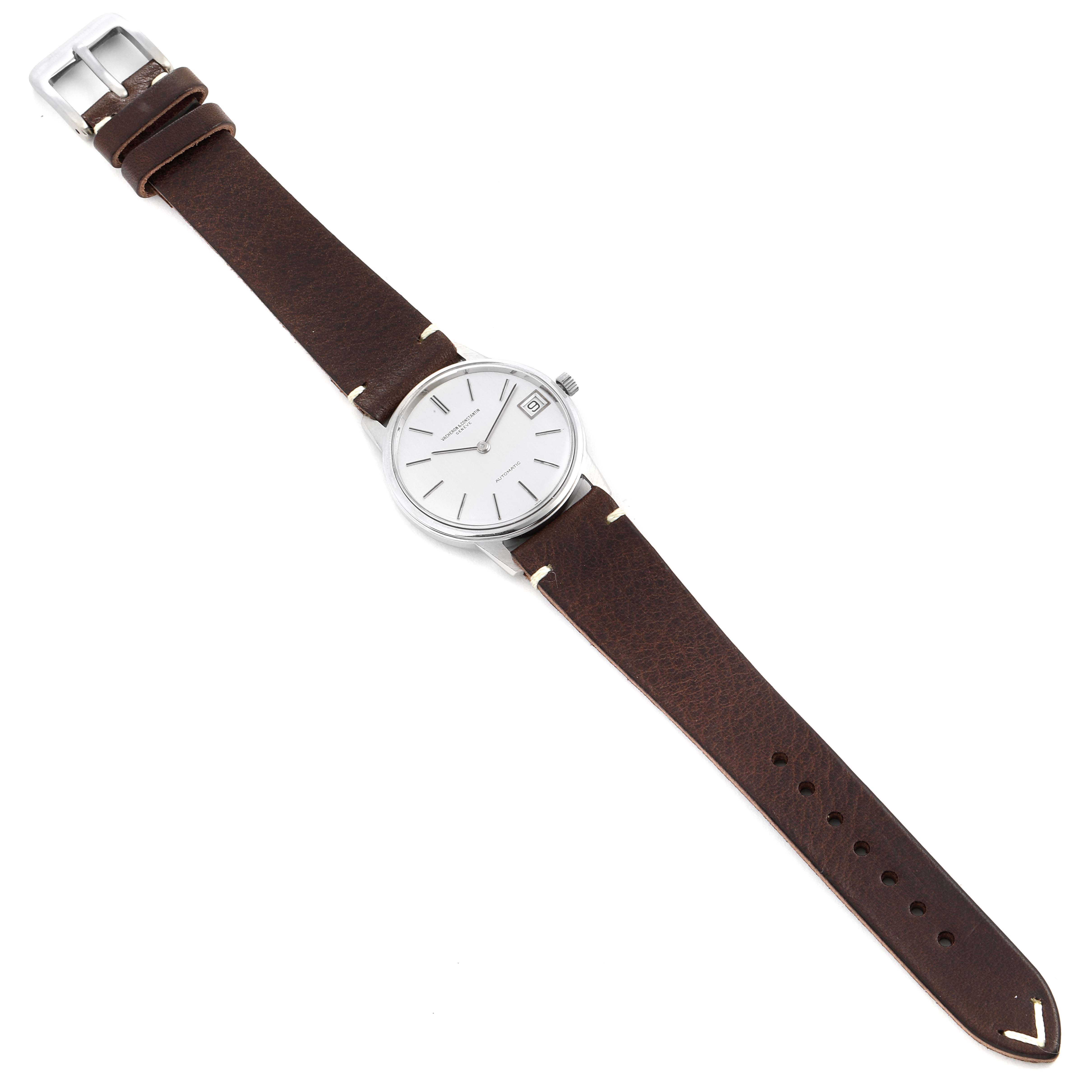 This image shows a Vacheron Constantin Patrimony 7592 Men's Stainless Steel Silver Dial 7592 Men's Stainless Steel Silver Dial watch from an angled top view, displaying its white dial, brown leather strap, and silver buckle.