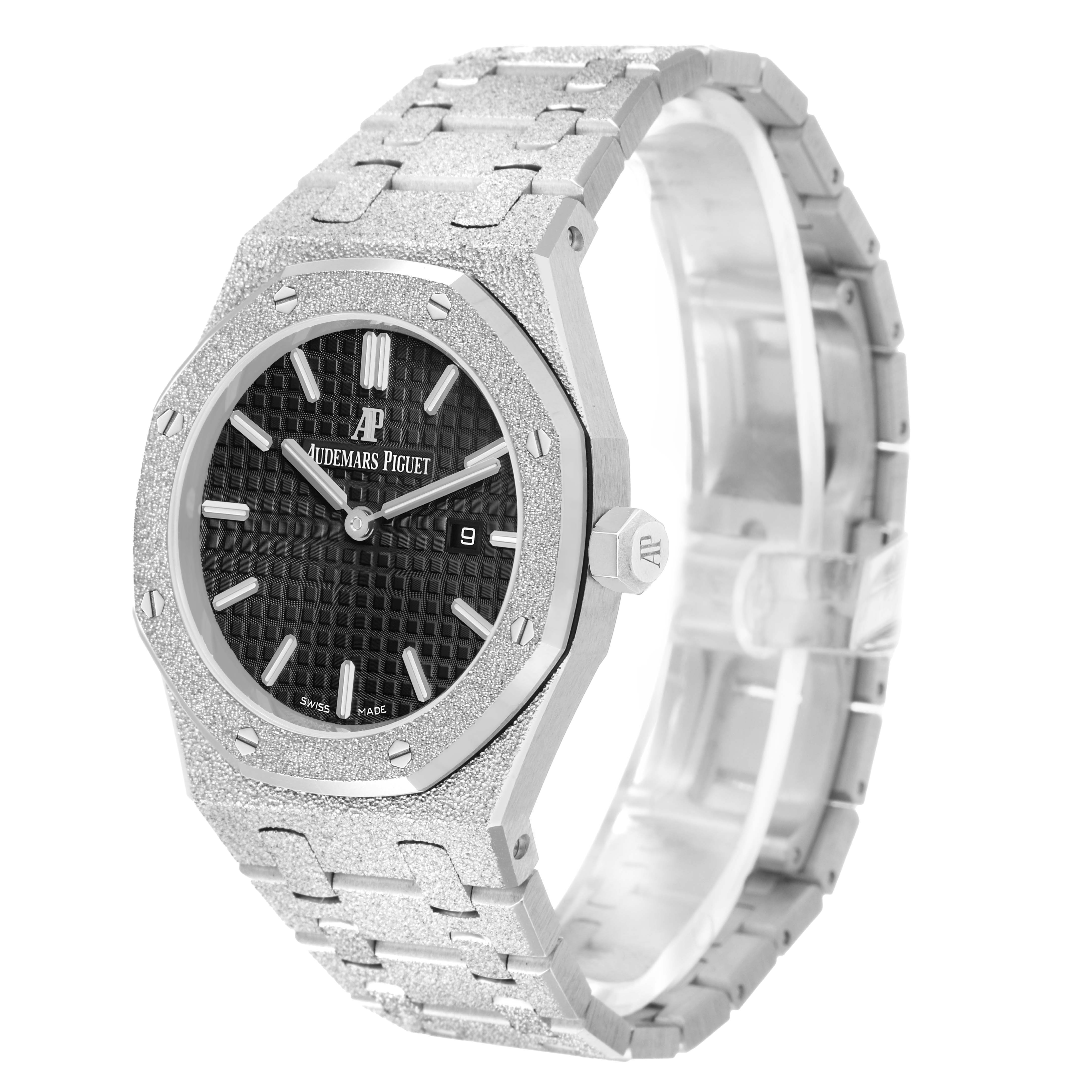 The Audemars Piguet Royal Oak 67653BC Women's White Gold Black Dial watch is shown at a three-quarter angle, highlighting the textured case, bezel, bracelet, and dial.