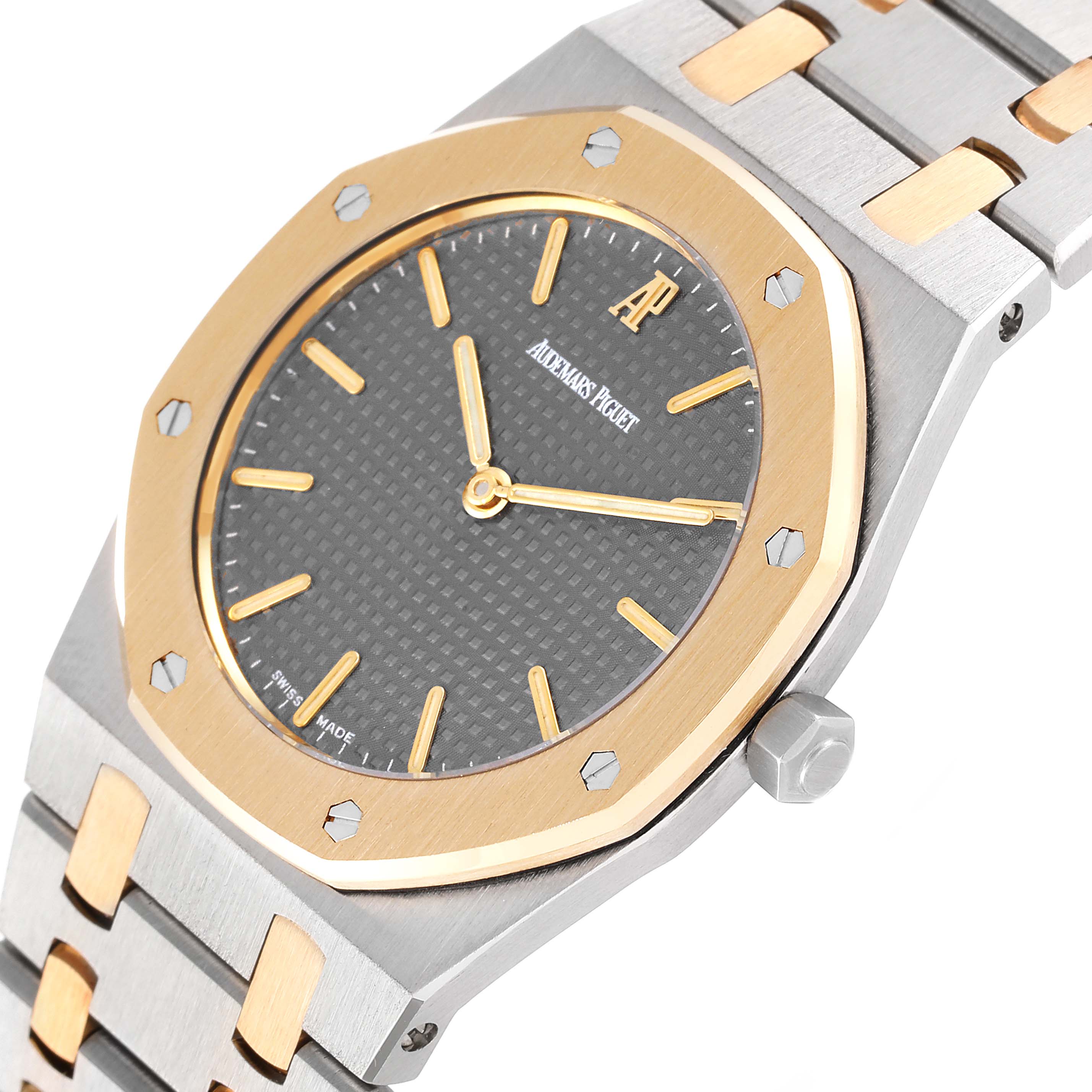 This image shows the Audemars Piguet Royal Oak 56303SA Men's Steel and Gold (two tone) Grey Dial 56303SA Men's Steel and Gold (two tone) Grey Dial watch at an angled close-up, highlighting the bezel, dial, and portion of the bracelet.