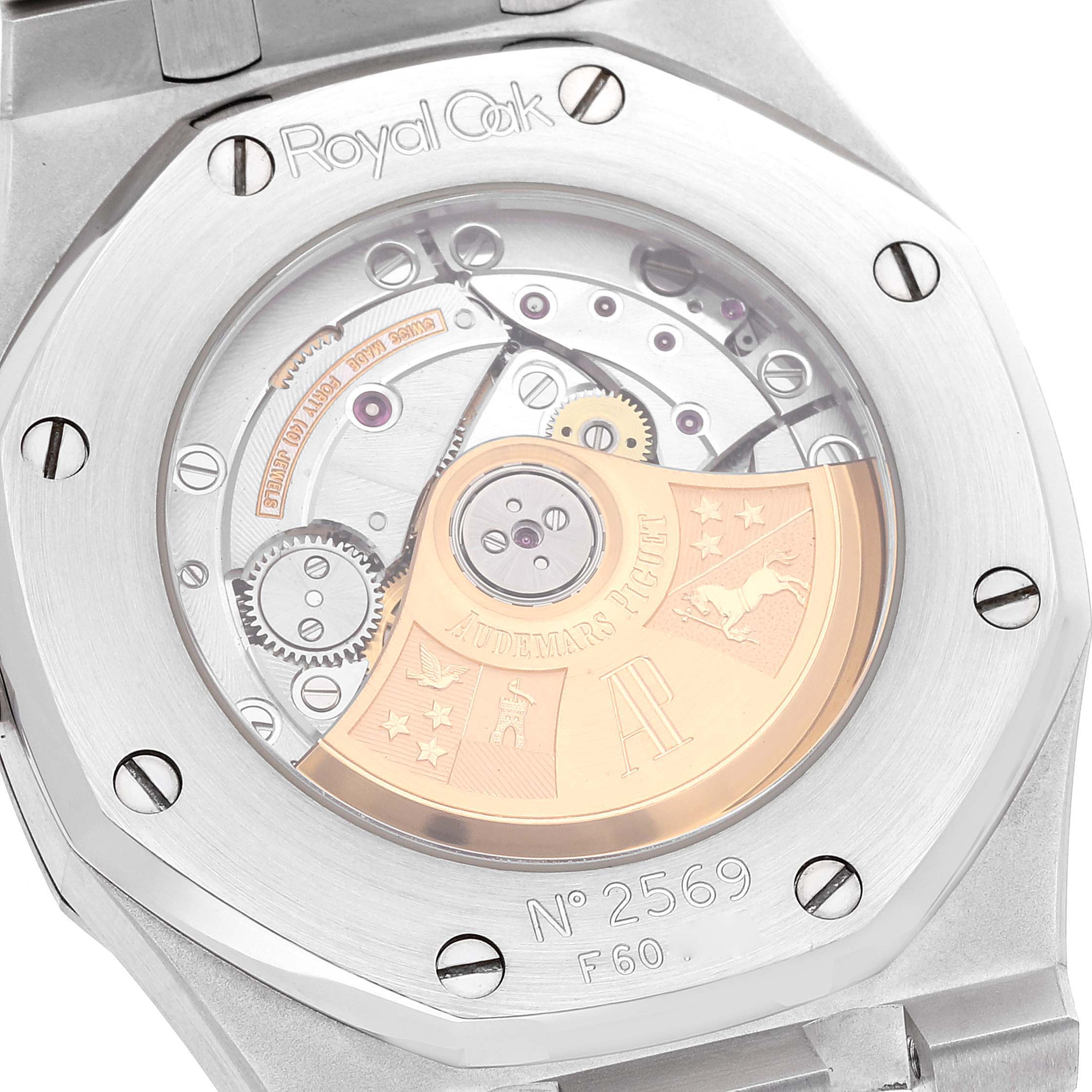 This image shows the back view of the Audemars Piguet Royal Oak 15300ST.00.1220ST.01 Men's Stainless Steel White Dial 15300ST.00.1220ST.01 Men's Stainless Steel White Dial watch, featuring its intricate mechanism and engraving.