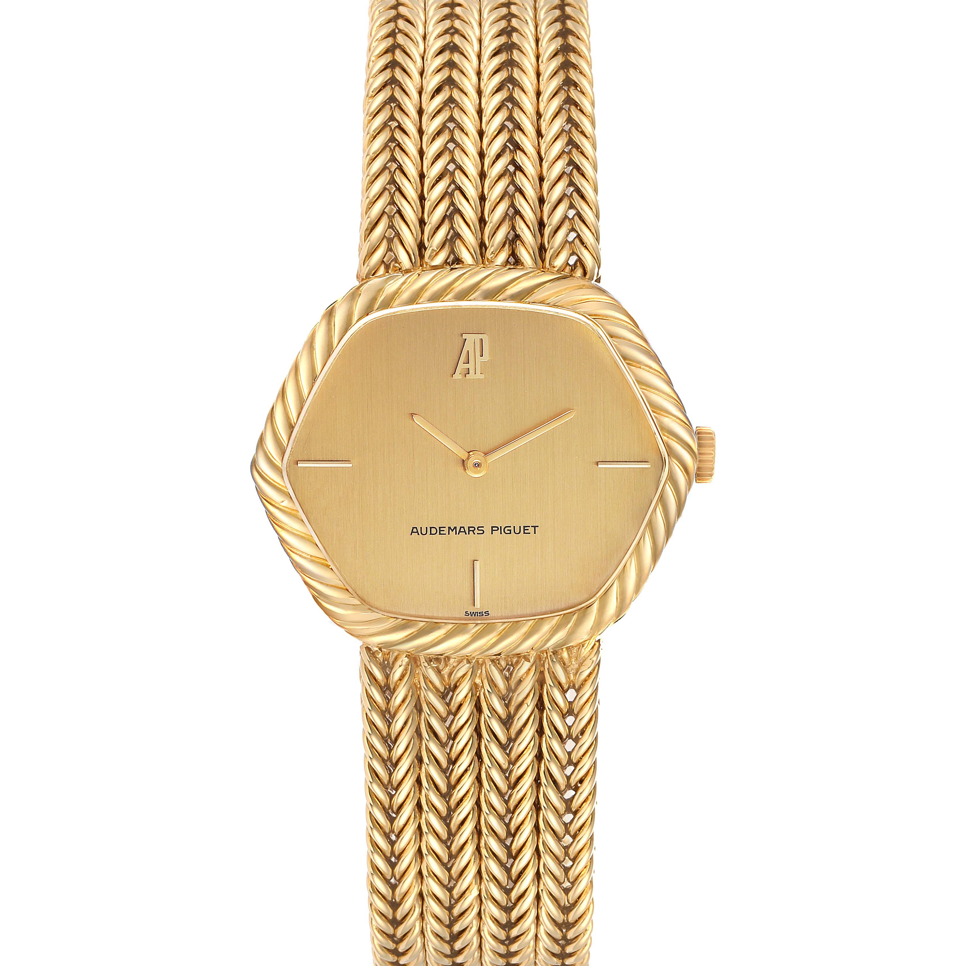 The image shows a front view of a Vintage Audemars Piguet watch, highlighting its gold case, dial, and woven bracelet.