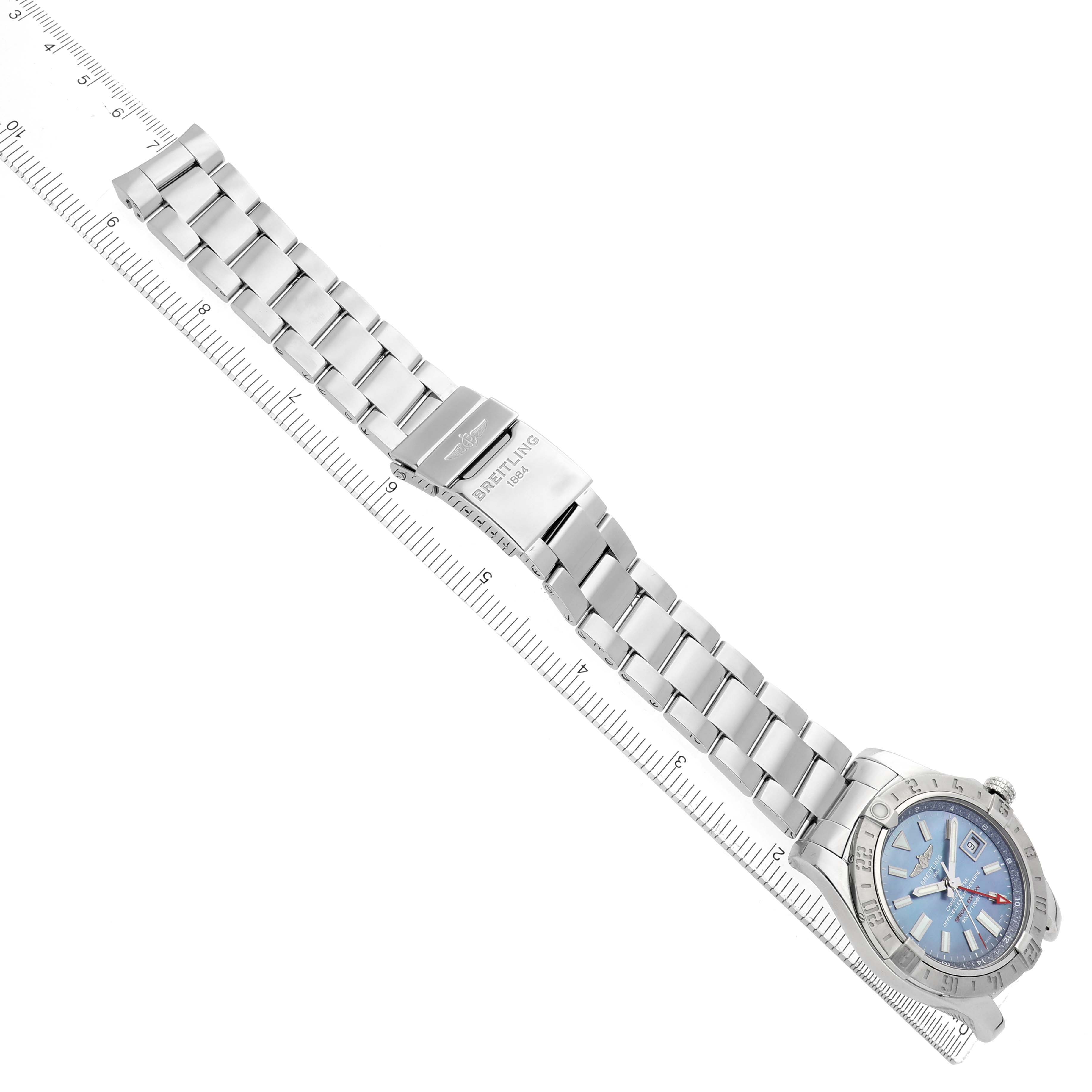 The Breitling Avenger A32390 Men
s Stainless Steel Mother of Pearl Dial watch is shown from a top view, displaying the blue dial, bezel, and metal bracelet.