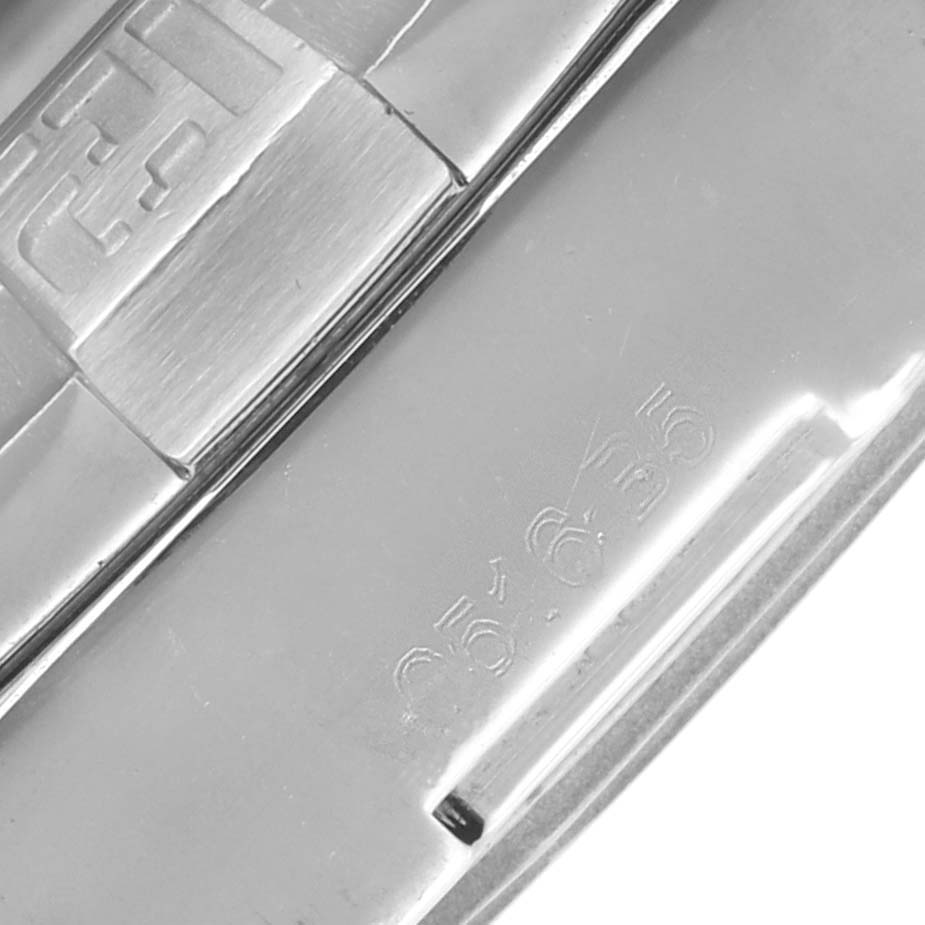 The image shows a close-up of the clasp on a Breitling Avenger A32390 Men
s Stainless Steel Mother of Pearl Dial watch bracelet.