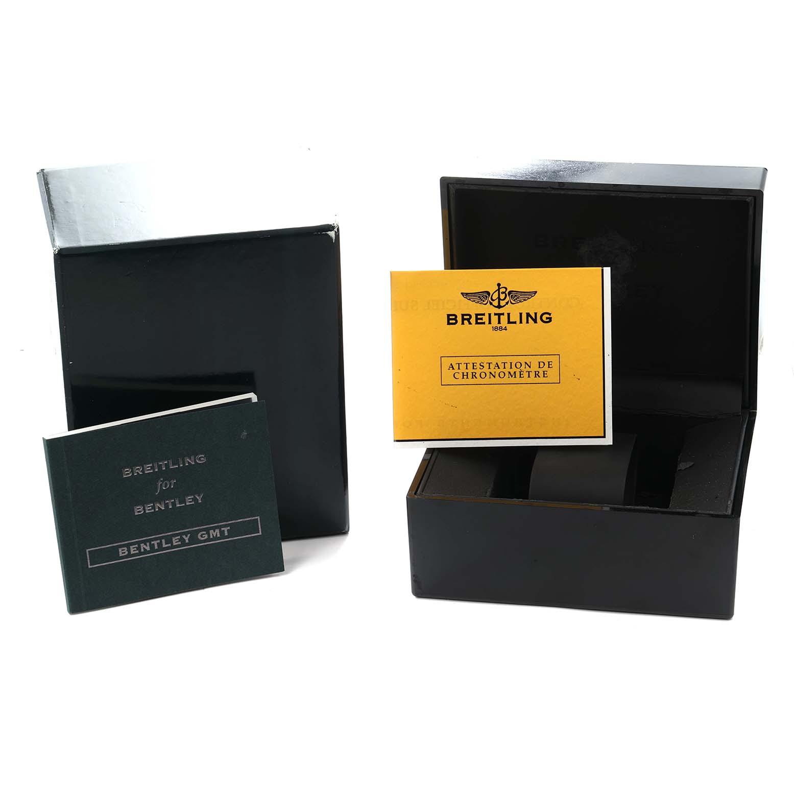 The image shows a Breitling Bentley A47362 Men
s Stainless Steel Black Dial watch box with its accompanying manuals and documents.