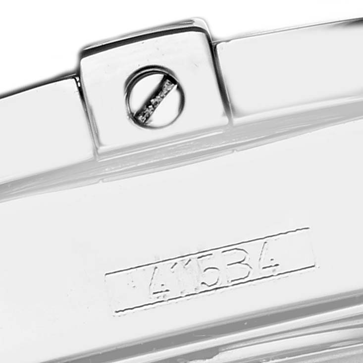 The image shows a close-up of a metallic clasp with a screw and a partial serial number on a Breitling A71356 Women's Stainless Steel White Dial Galactic Cockpit watch.