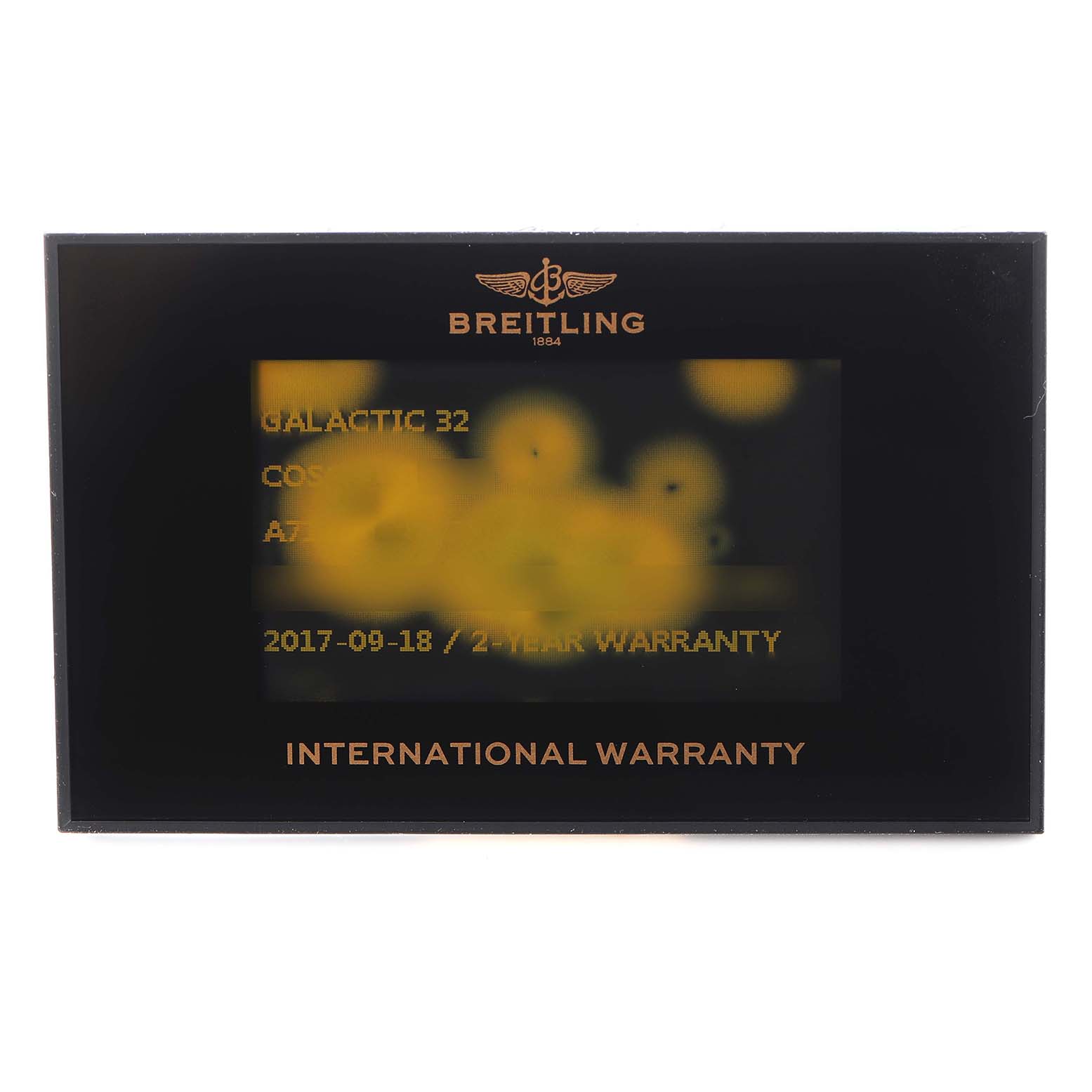 The image shows an international warranty card for a Breitling A71356 Women's Stainless Steel White Dial Galactic Cockpit Mother of Pearl Diamond Ladies Watch model A71356.