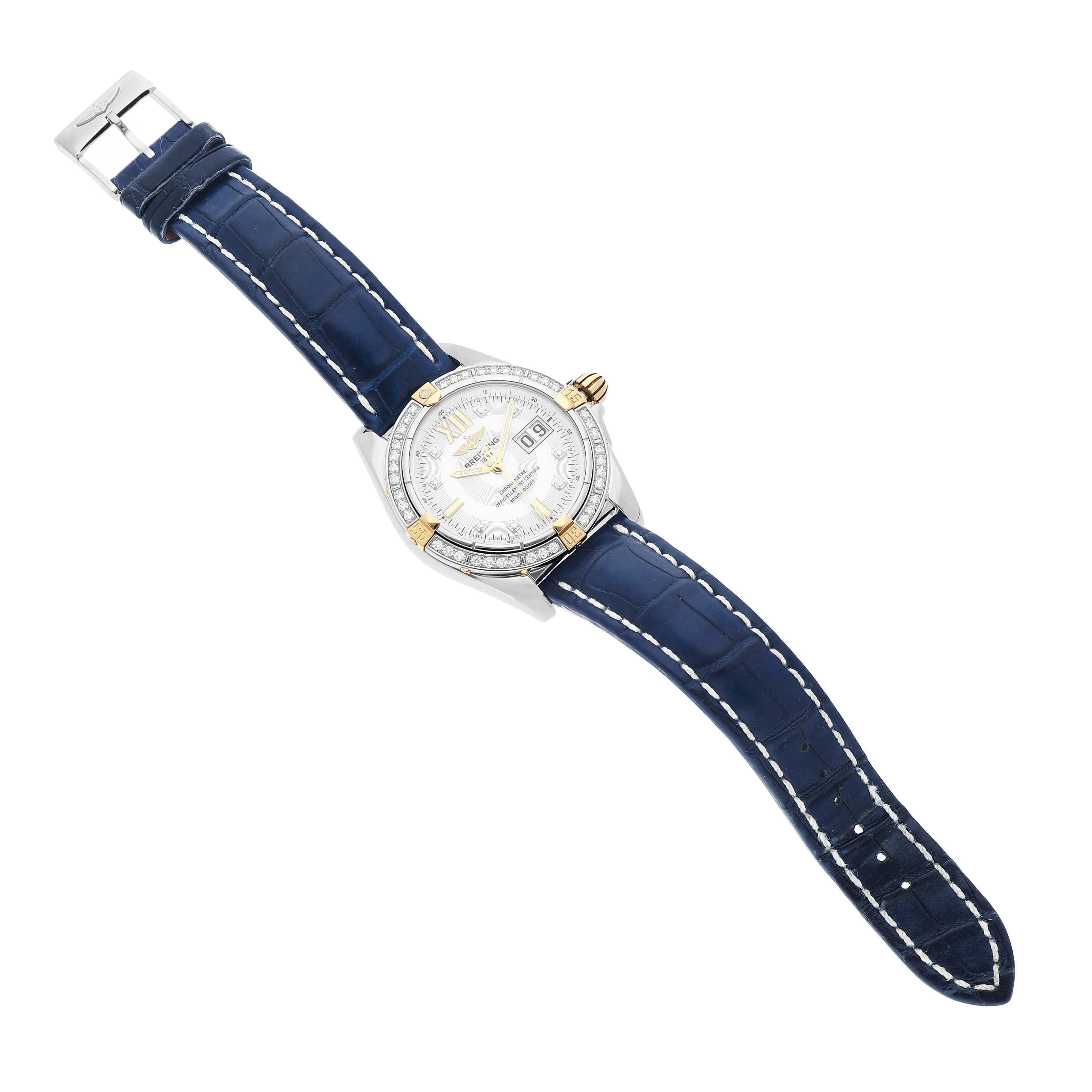 The Breitling Windrider B49350 Men's Steel and Gold (two tone) Mother of Pearl Dial watch is shown in a top-down view displaying the face, bezel, and blue leather strap.