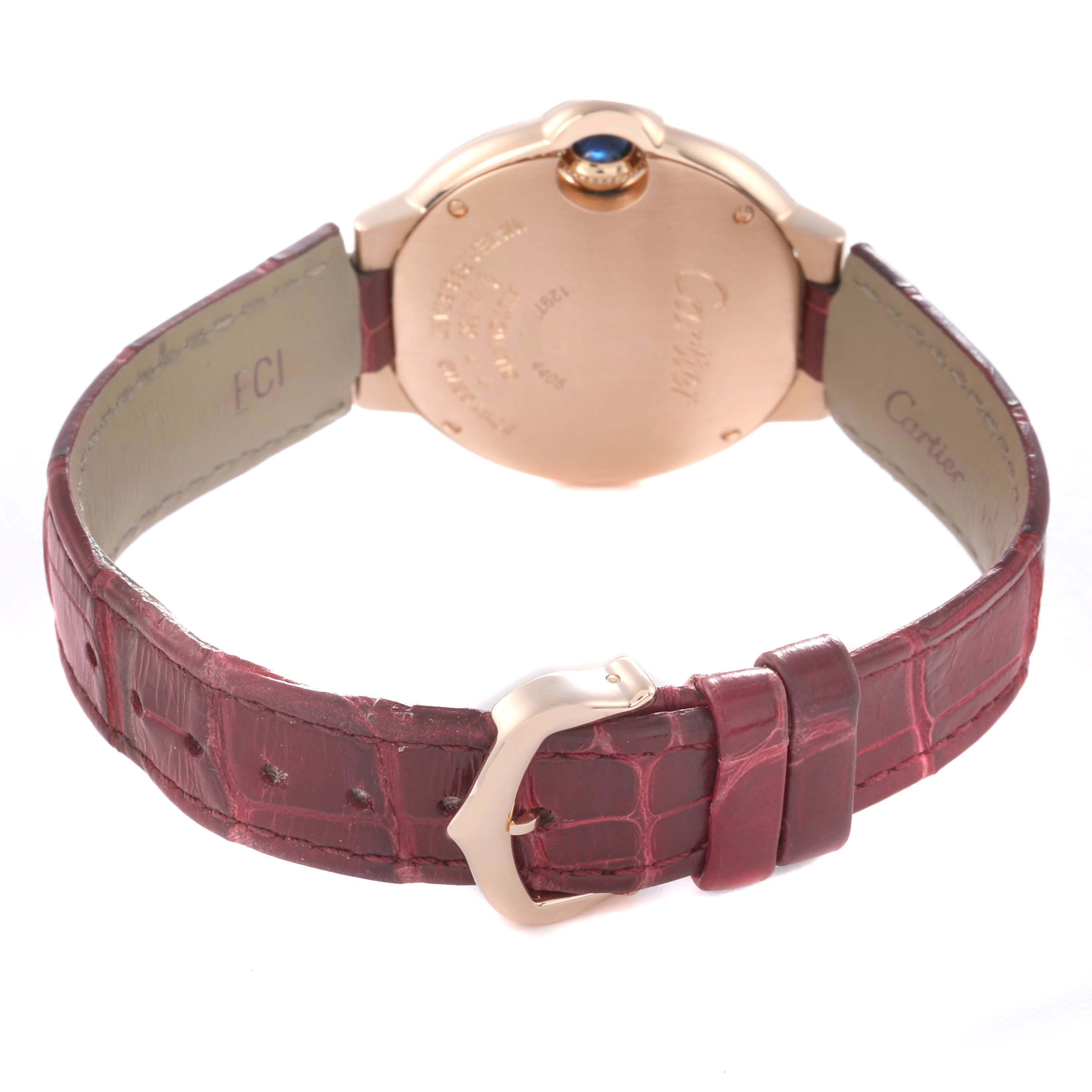 The image shows the back of the Cartier Ballon Bleu WJBB0080 Women
s Rose Gold Silver Dial watch, highlighting the case back and leather strap.