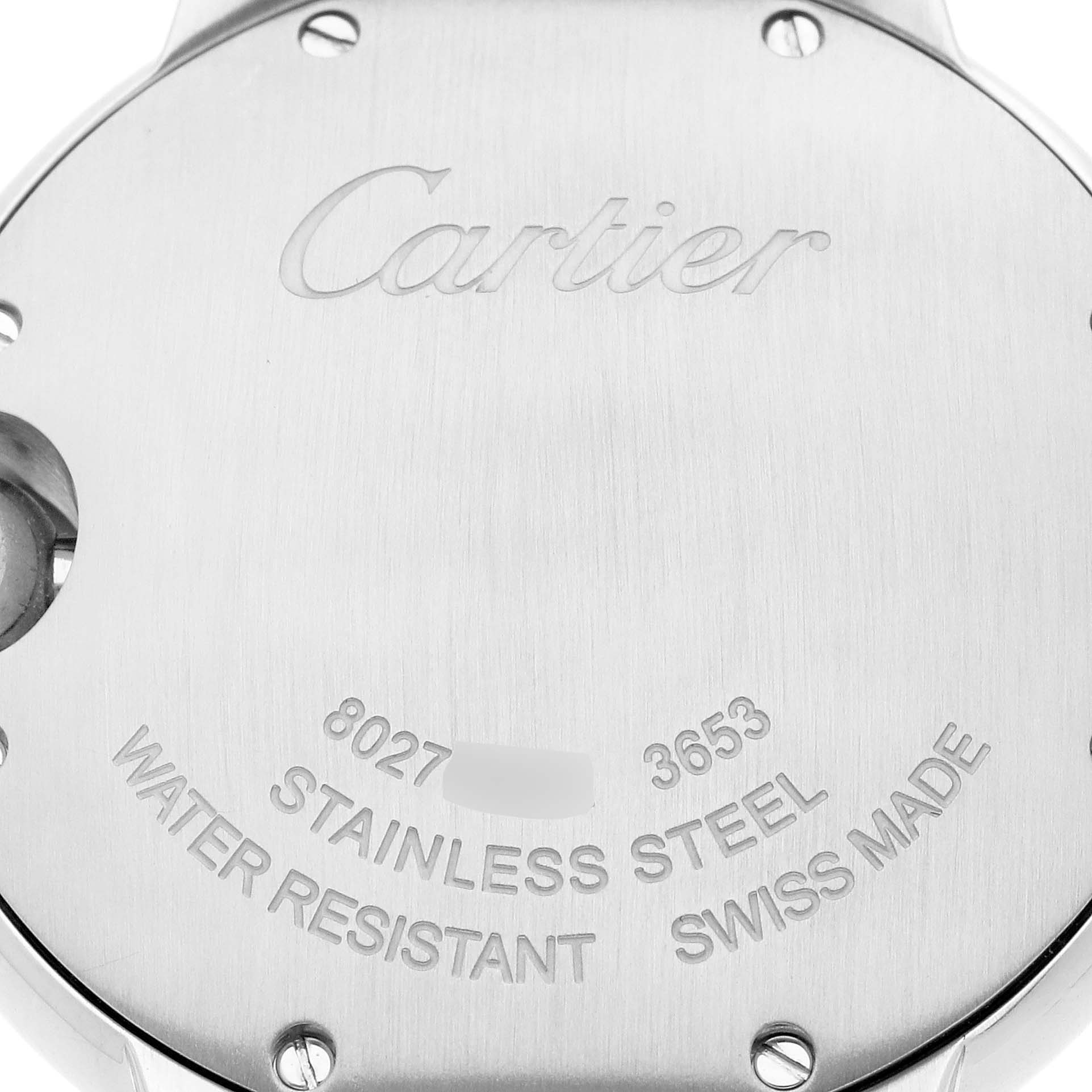 The image shows the back of a Cartier Ballon Bleu W6920084 Women
s Stainless Steel Silver Dial watch, highlighting its stainless steel material and engravings.