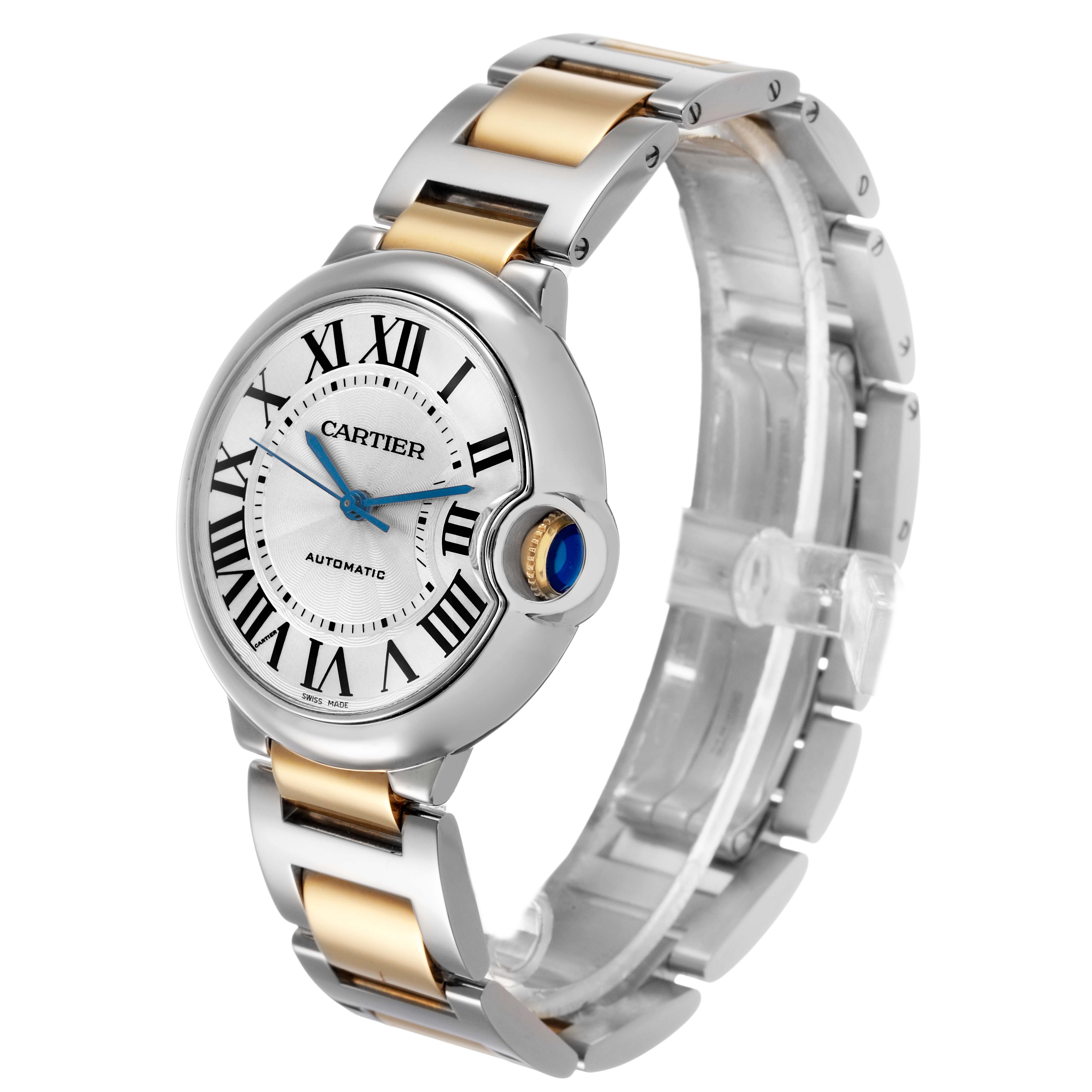 The Cartier Ballon Bleu W6920047 Women's Steel and Gold (two tone) Silver Dial watch is shown at an angle displaying the face, Roman numerals, crown, and two-tone bracelet.