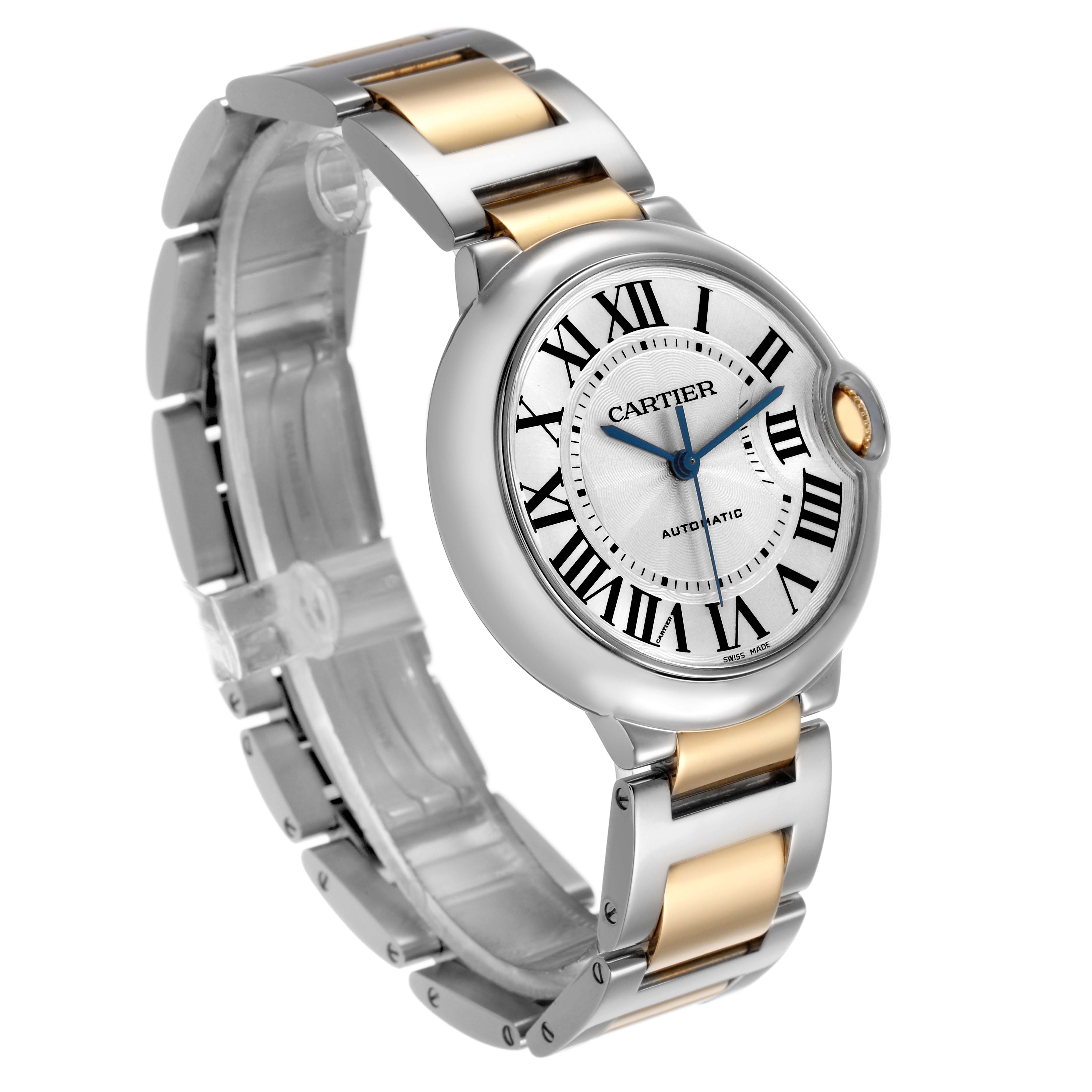 The Cartier Ballon Bleu W6920047 Women's Steel and Gold (two tone) Silver Dial watch is shown at an angled side view, highlighting its stainless steel and gold bracelet and round dial.