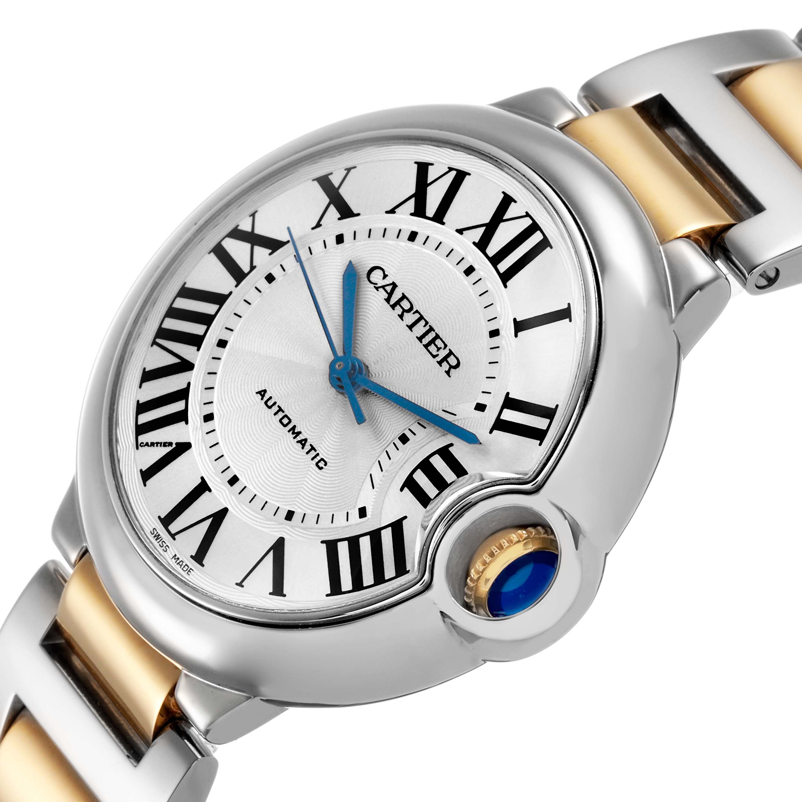The Cartier Ballon Bleu W6920047 Women's Steel and Gold (two tone) Silver Dial watch is shown at a tilted angle, highlighting the dial, Roman numerals, blue hands, and crown with a blue cabochon.