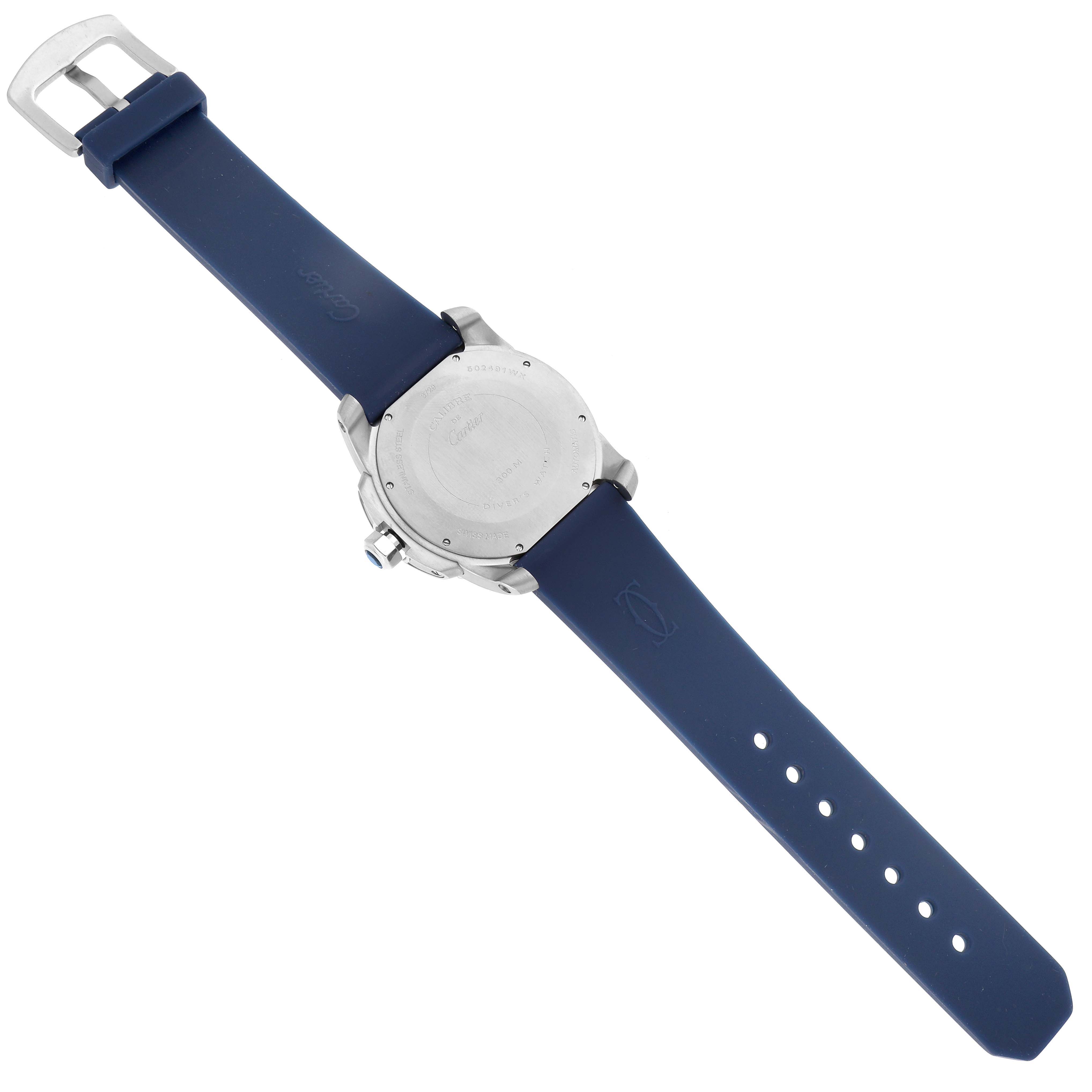 The image shows the back view of a Calibre de Cartier watch by Cartier, highlighting the case back and blue strap.