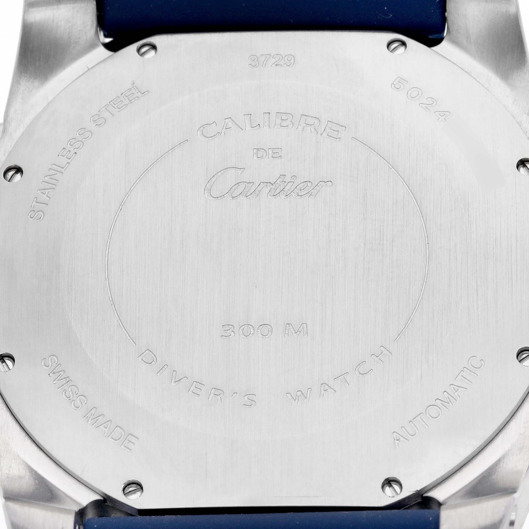 The image shows the case back of a Calibre de Cartier watch by Cartier, indicating it is stainless steel and has a 300M water resistance.