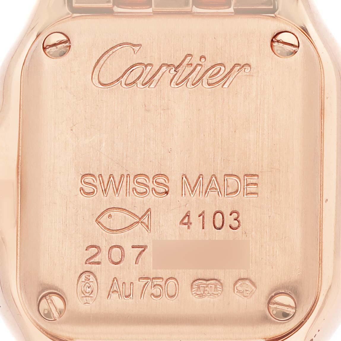 The image shows the back of a Cartier Panthère watch, highlighting engravings and hallmarks.